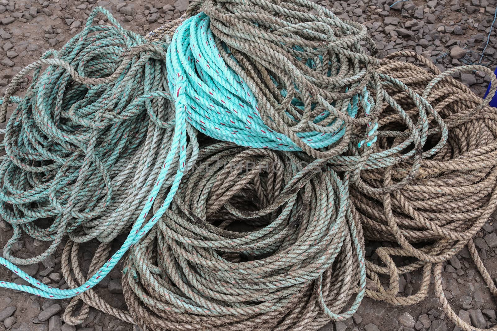 A pile of rope used on a fishing boat