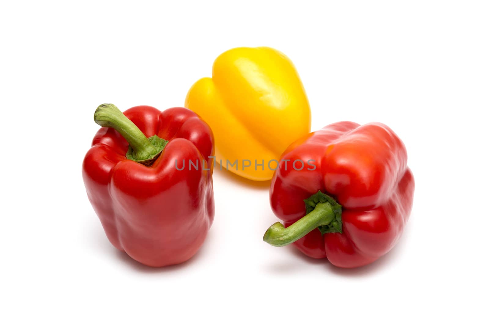 Peppers on white background by DNKSTUDIO