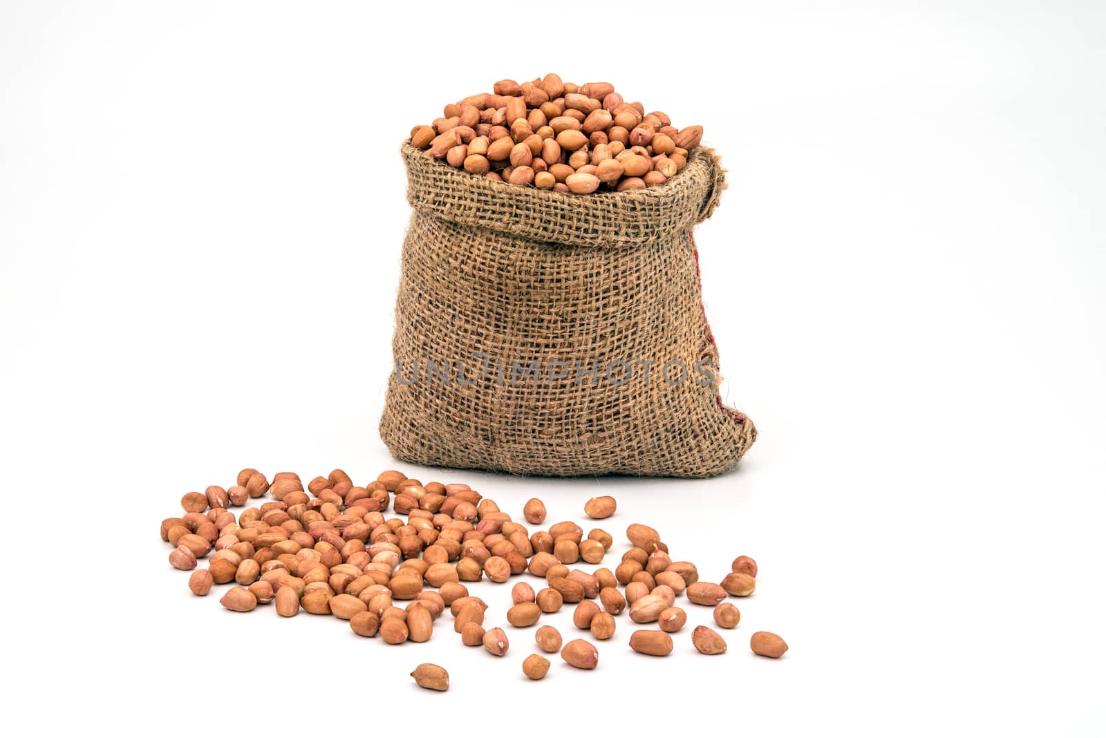 Bag Full of Peanuts on White Background