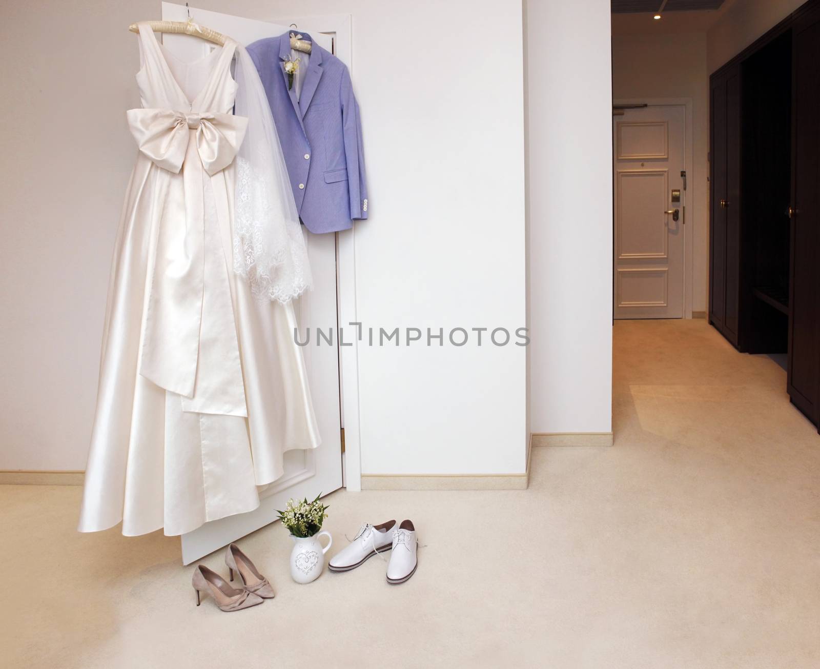 Wedding accessories - dress for the bride, for the groom jacket and beautiful shoes