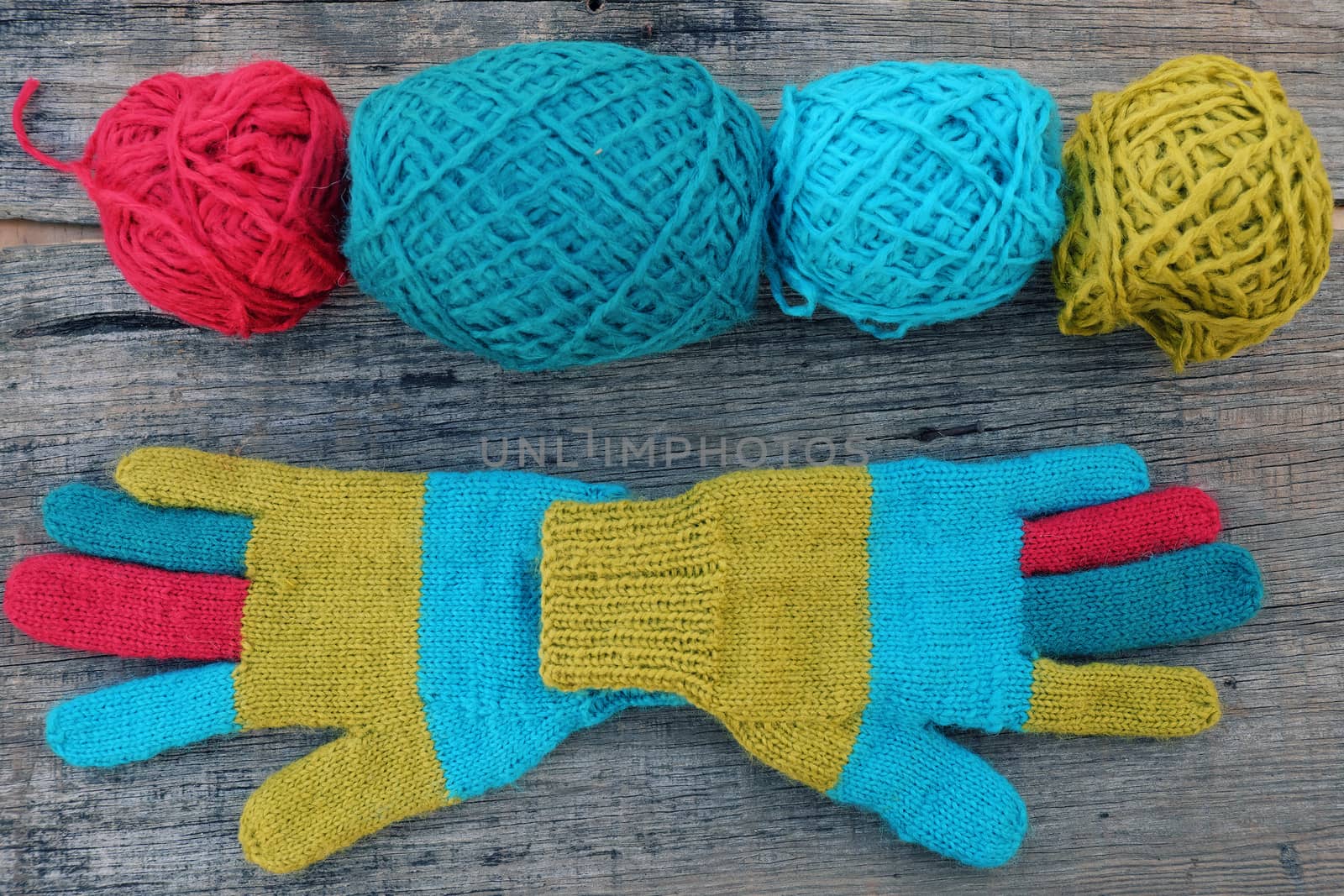 Abstract accessory for cold day in winter, colorful gloves make from leisure hobby in free time, handmade gift for mother day or valentine day