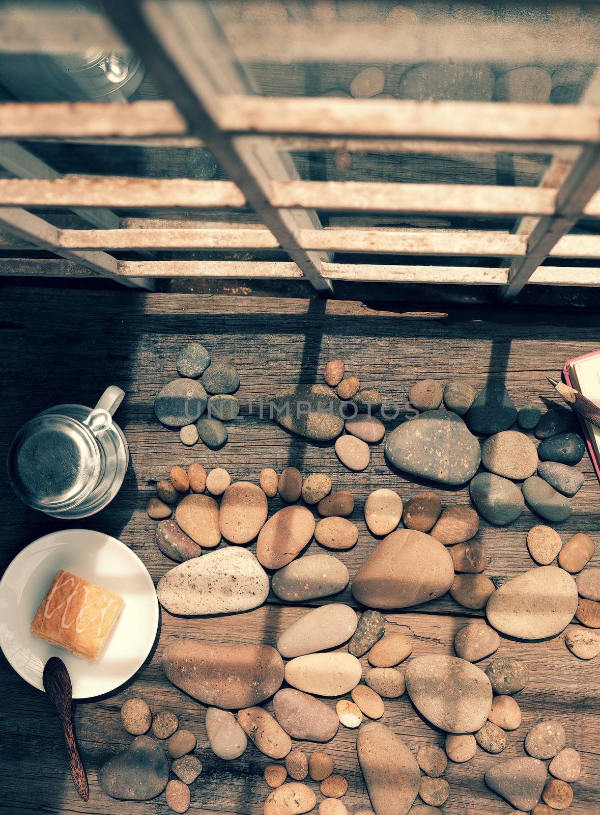 Relax morning for new day with coffee time in cafeteria, abstract cafe interior with table near glass window, pebbles background make group of foot, romantic view for breakfast in vintage color