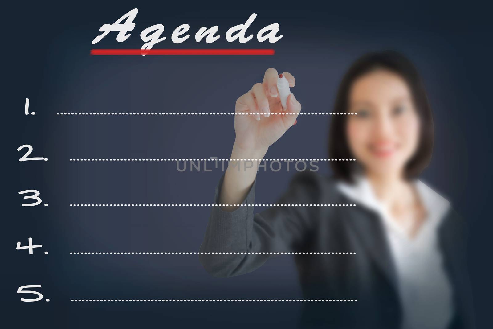 Agenda Woman writing word 