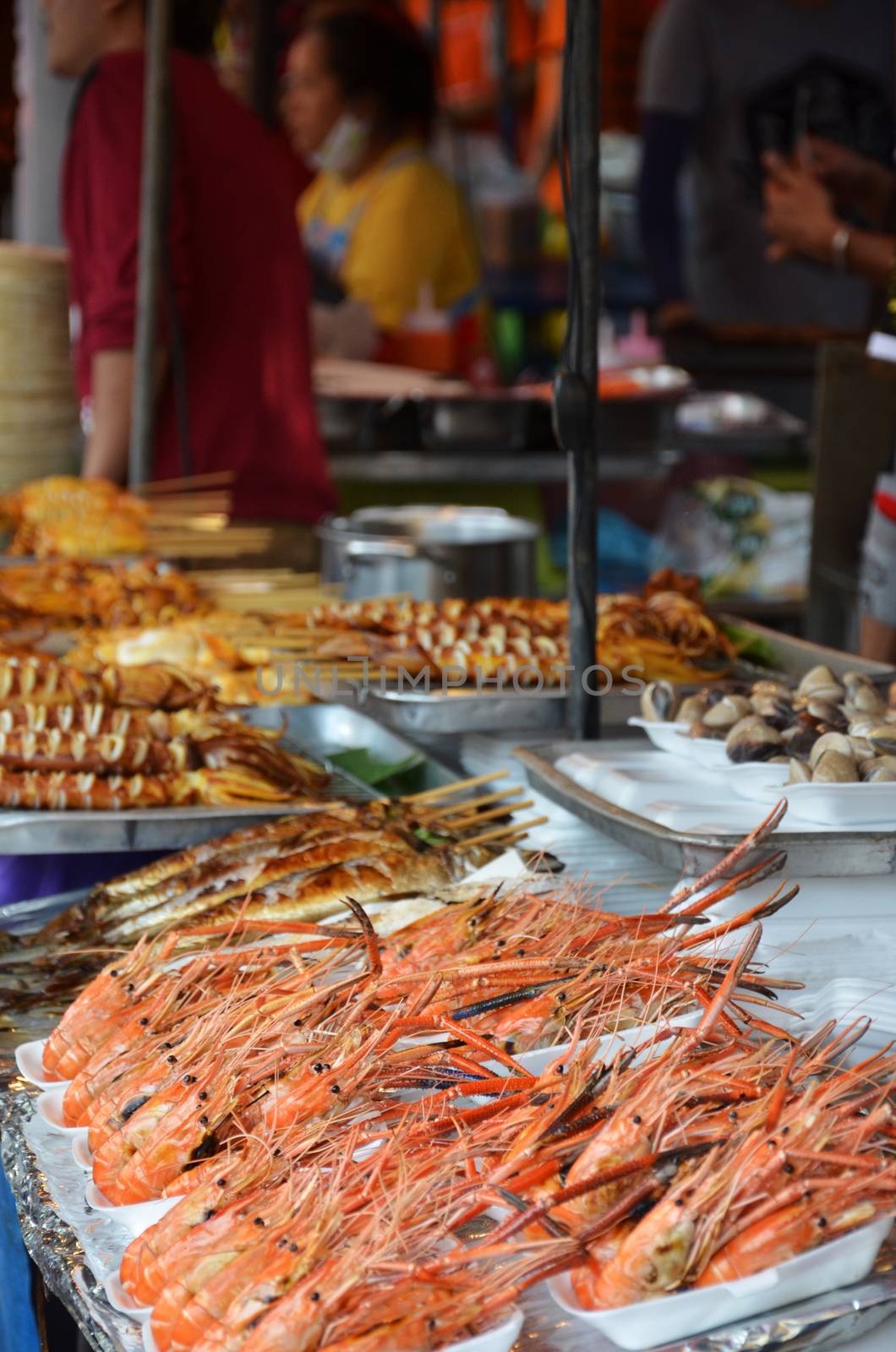 BBQ Prawns on metal grill at Bangkok