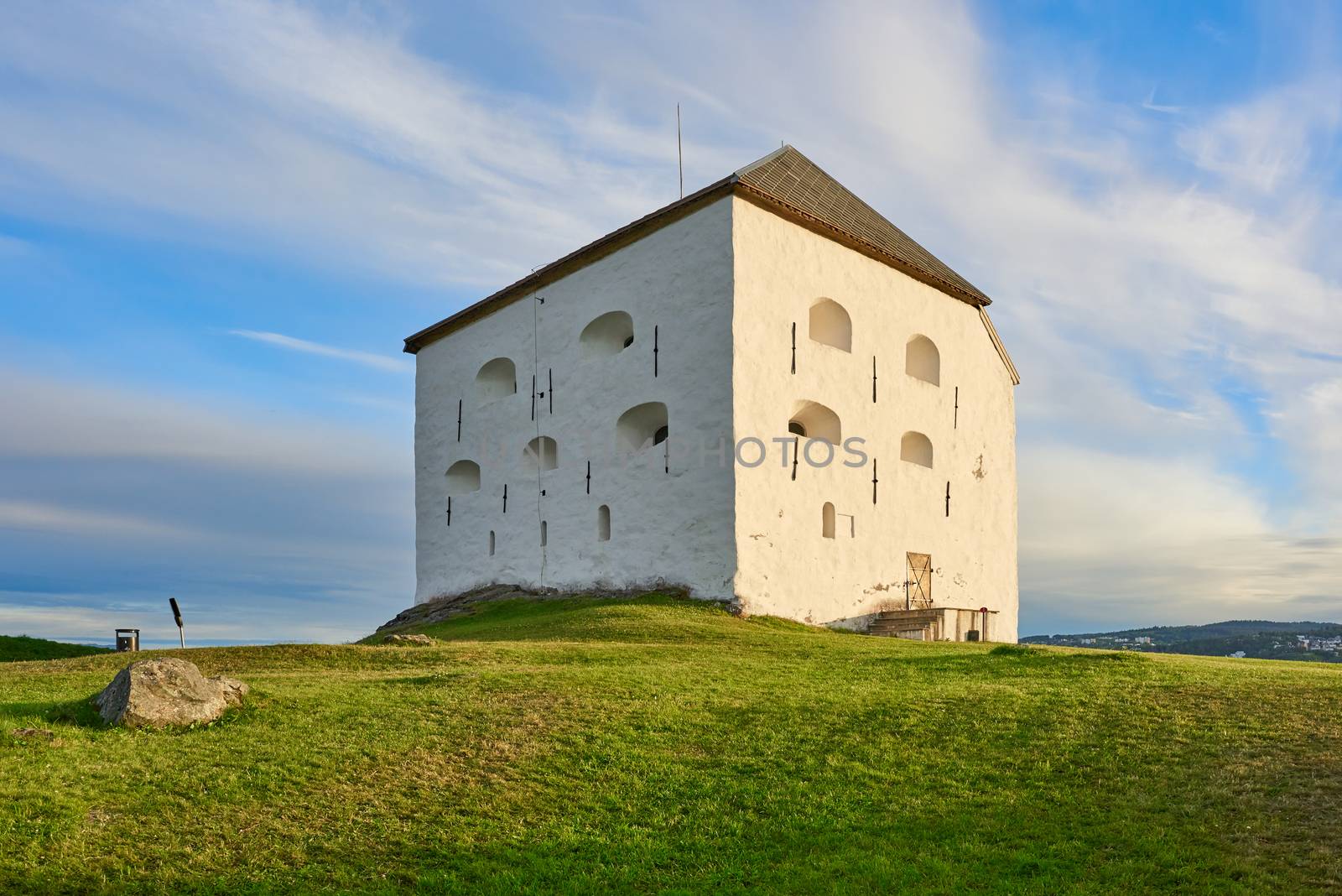 Kristiansten fortress in Trondheim Norway on a grassy hill at summertime.