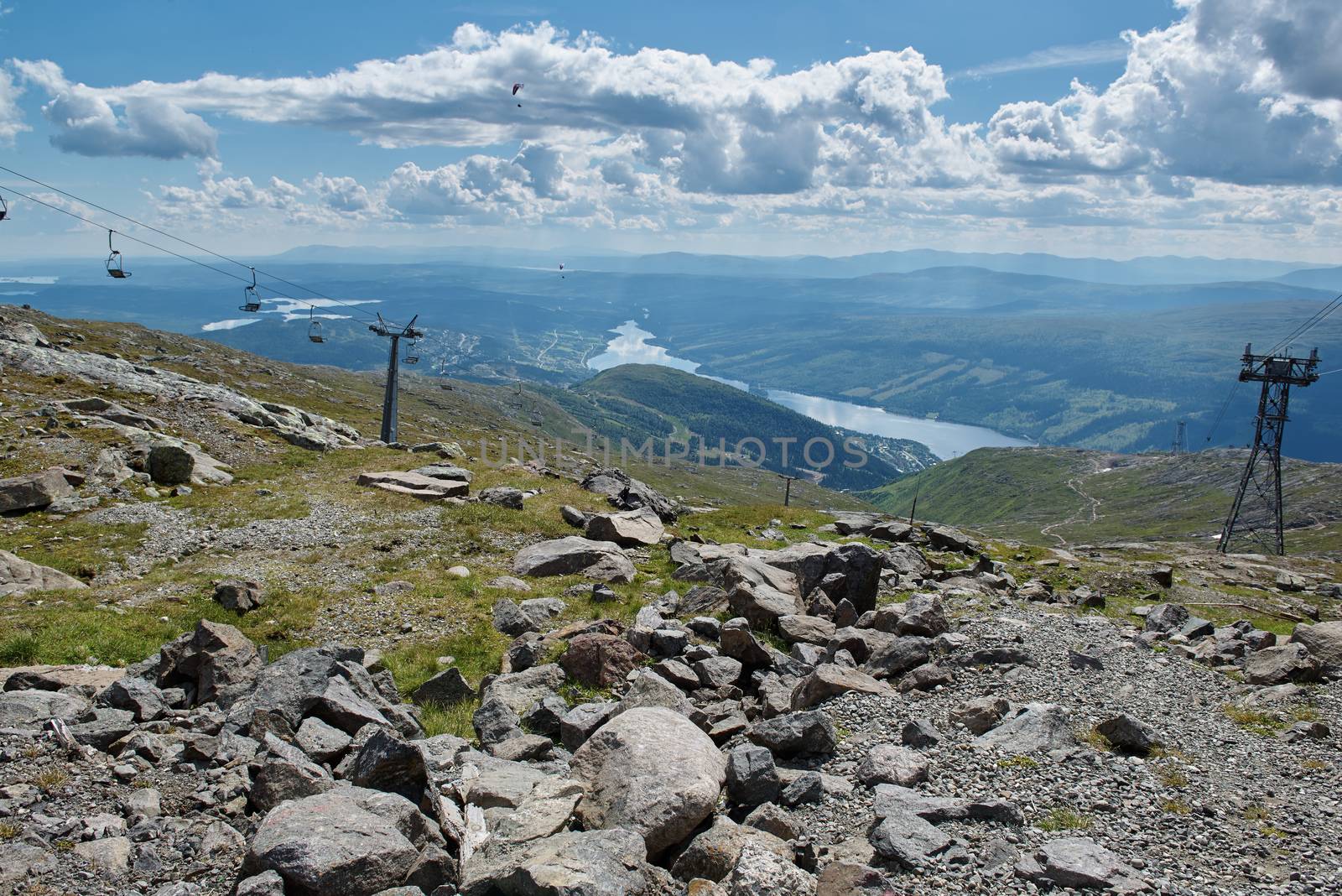 View of cable car lift, ski lift and paragliders at Åreskutan mountain, Åre, Sweden.