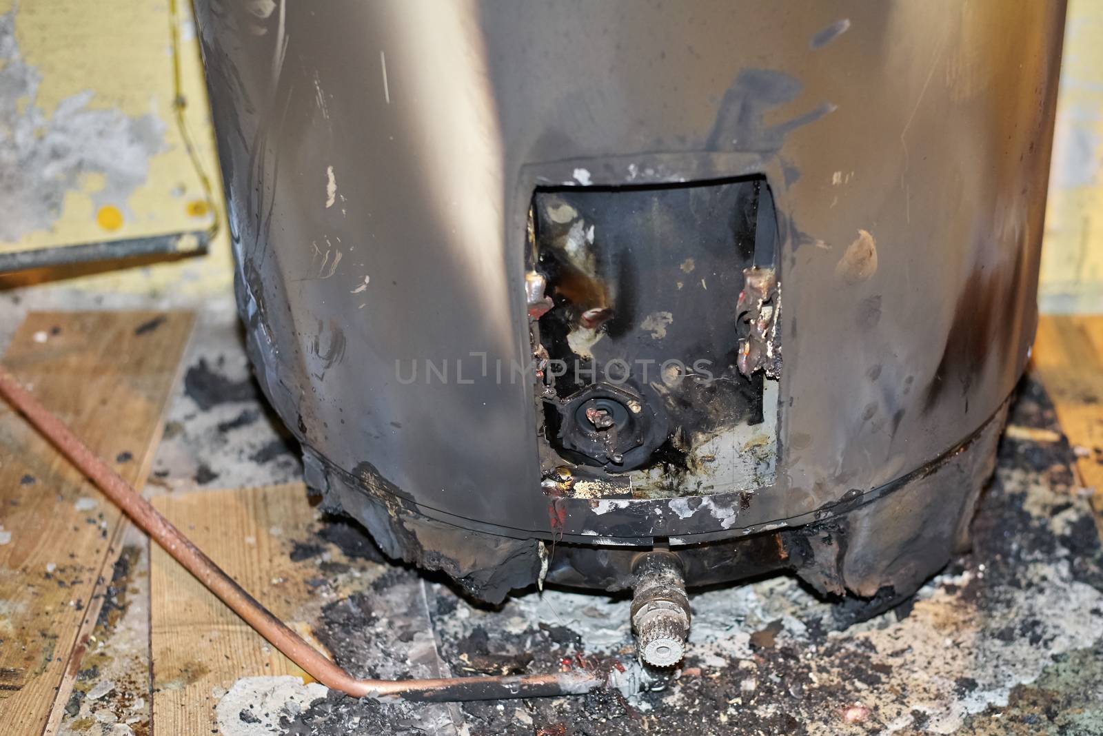 Burned electrical connection in water heater. How it looks like after a fire.