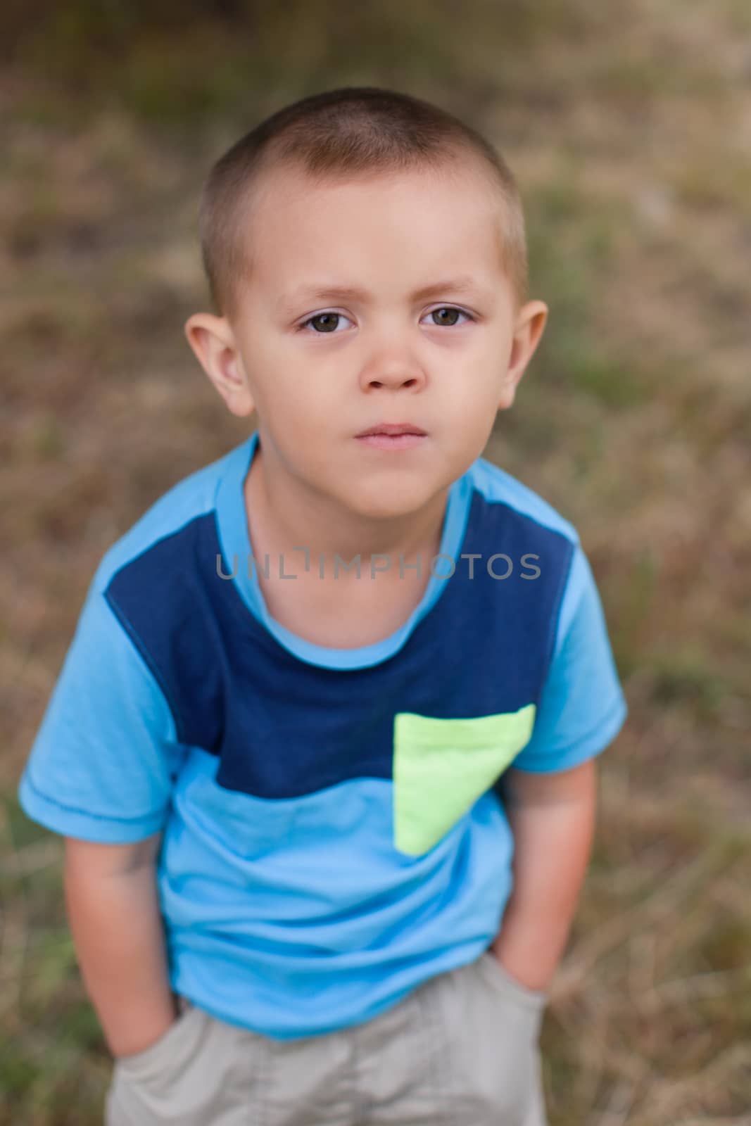 Portrait of a boy close up in nature by lanser314