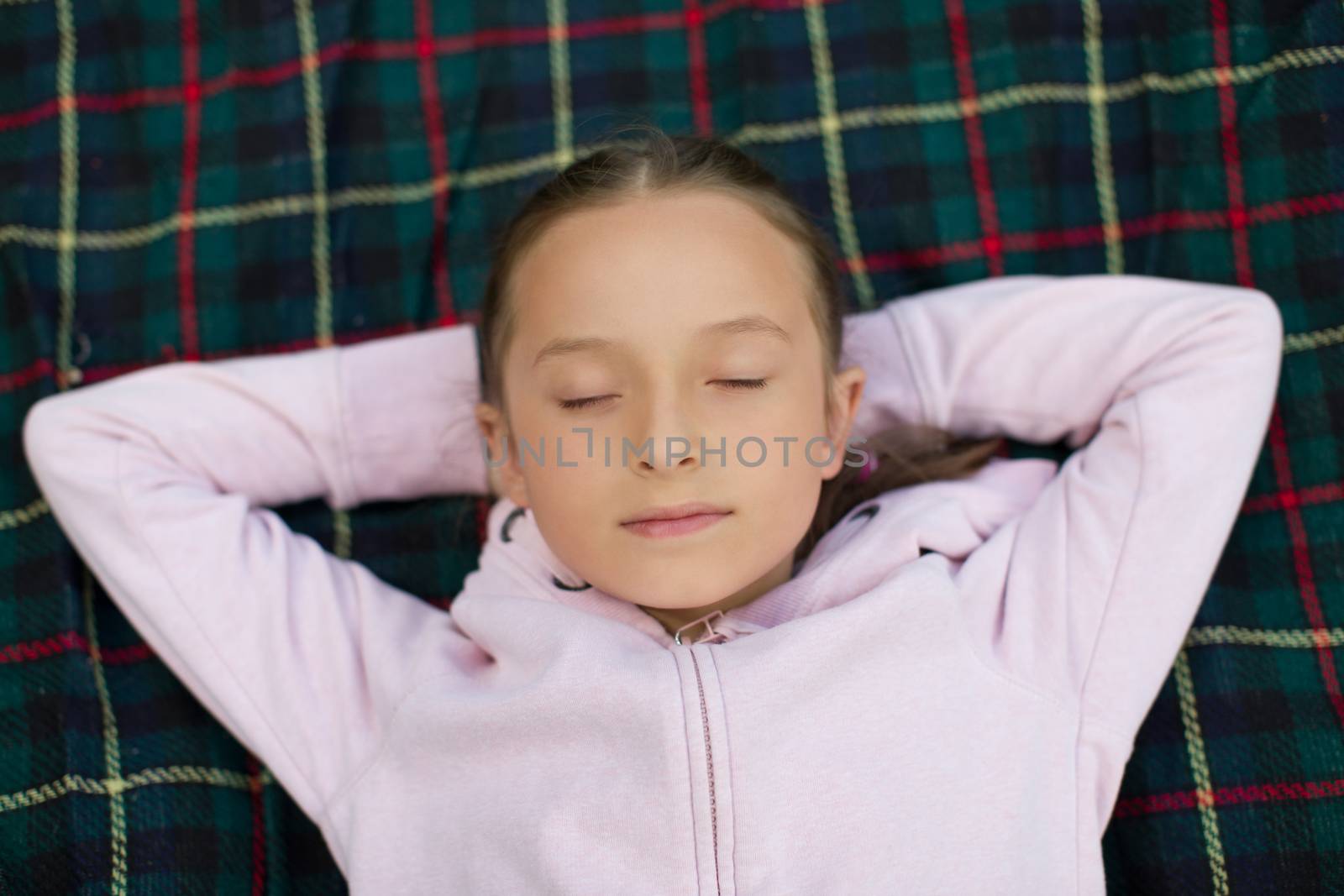 Girl resting in the open air, children's sleep
