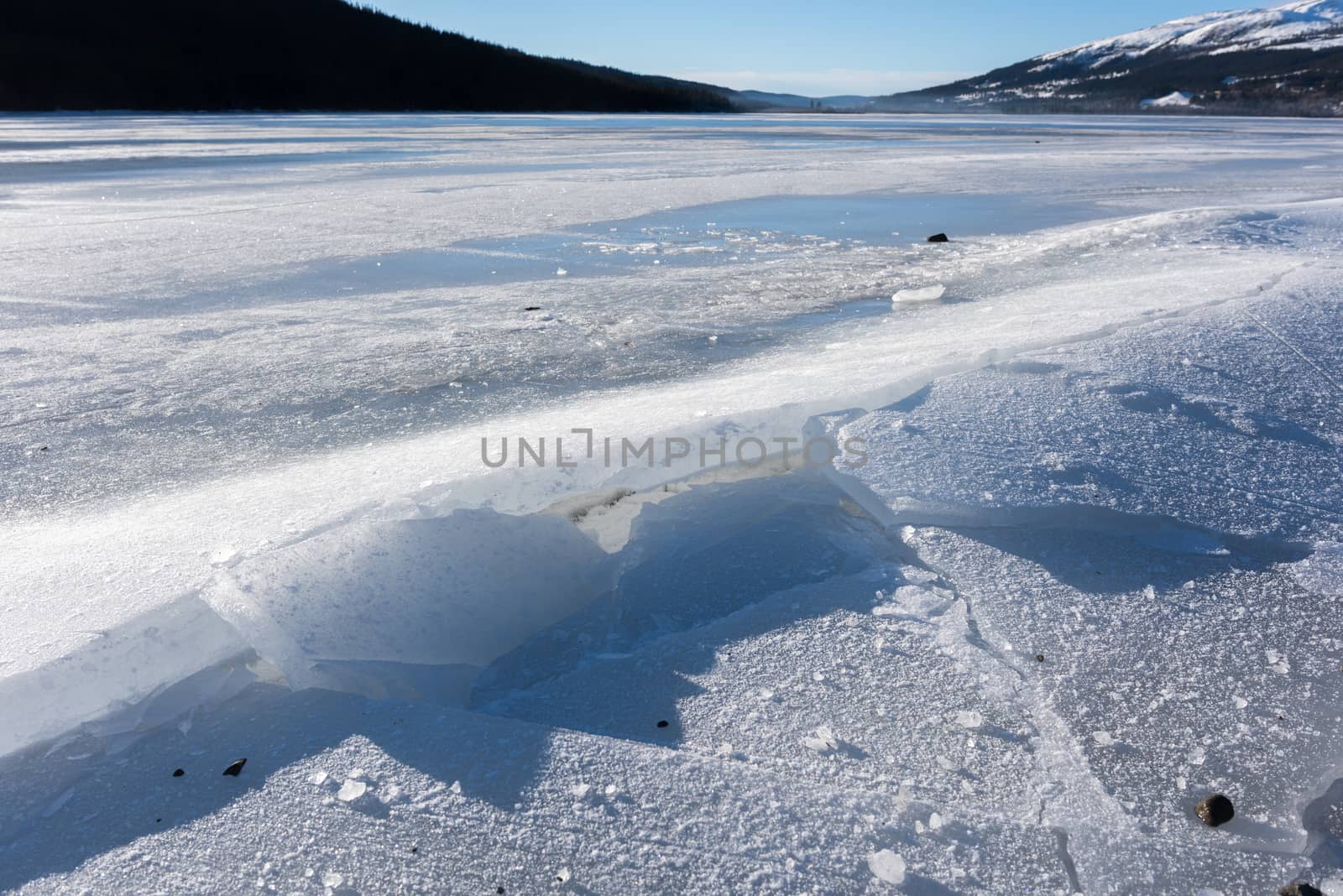 Cracked ice on lake in Aare, Sweden.