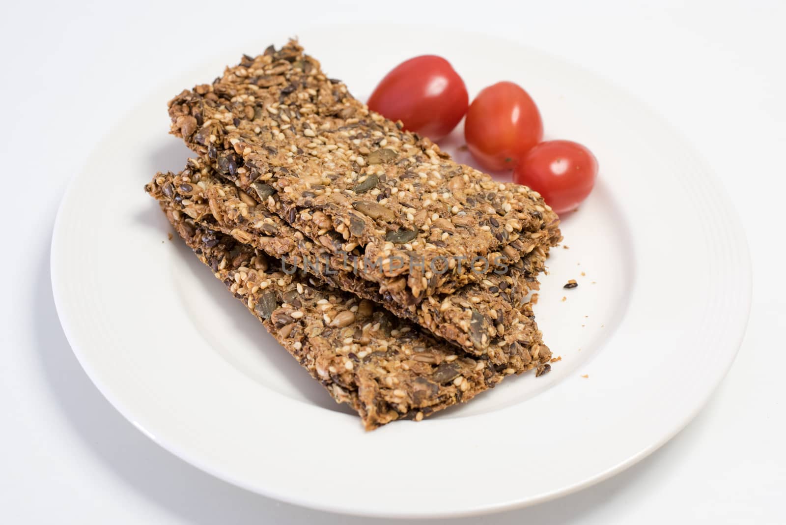 Crispy bread made from seeds, with tomatoes.