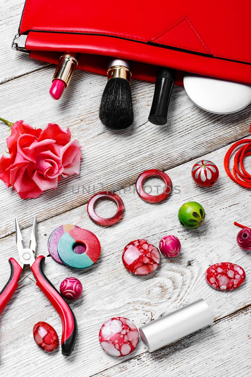 beads for jewelry and womens tote bag with cosmetics