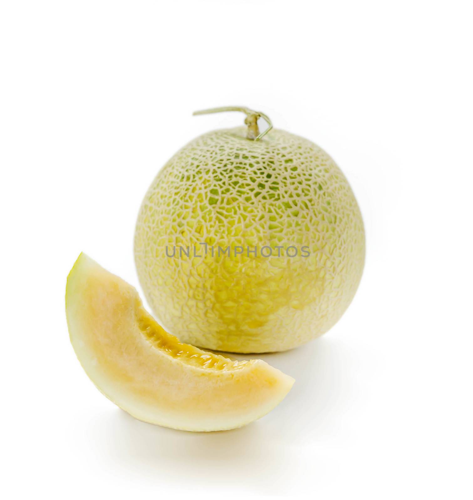 Ripe cantaloupe melon fruit on wooden background