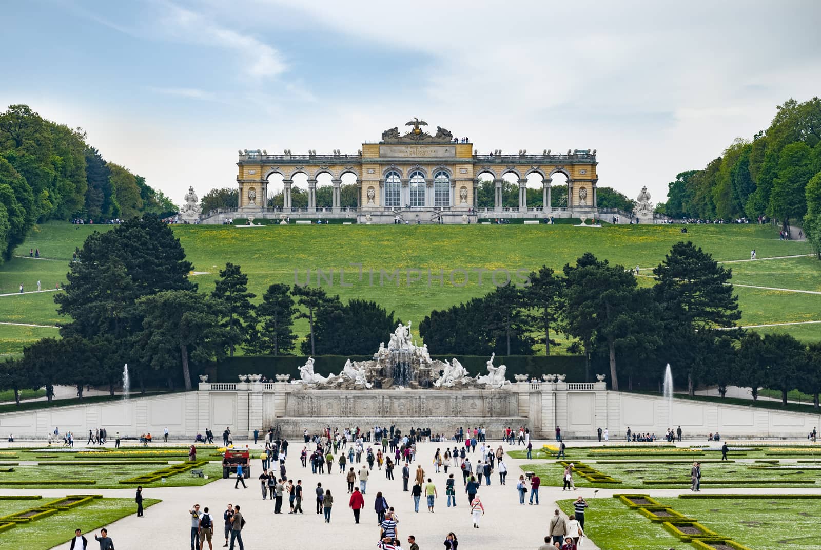 Vienna, Austria - April 28, 2011: The Gloriette was built in 1775 to glorify Habsburg power. It's located on the top of the hill in the Schoenbrunn Palace Garden, in Vienna, Austria.