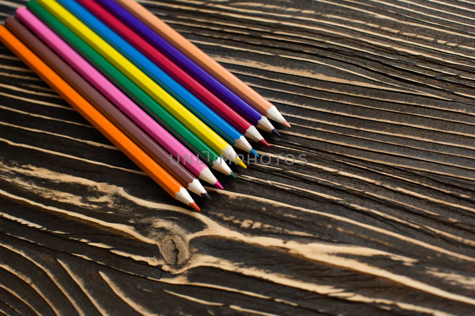 Colored pencils on the table by lanser314
