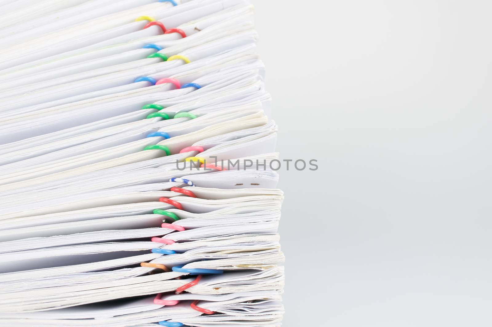 Pile overload document place on white background by eaglesky