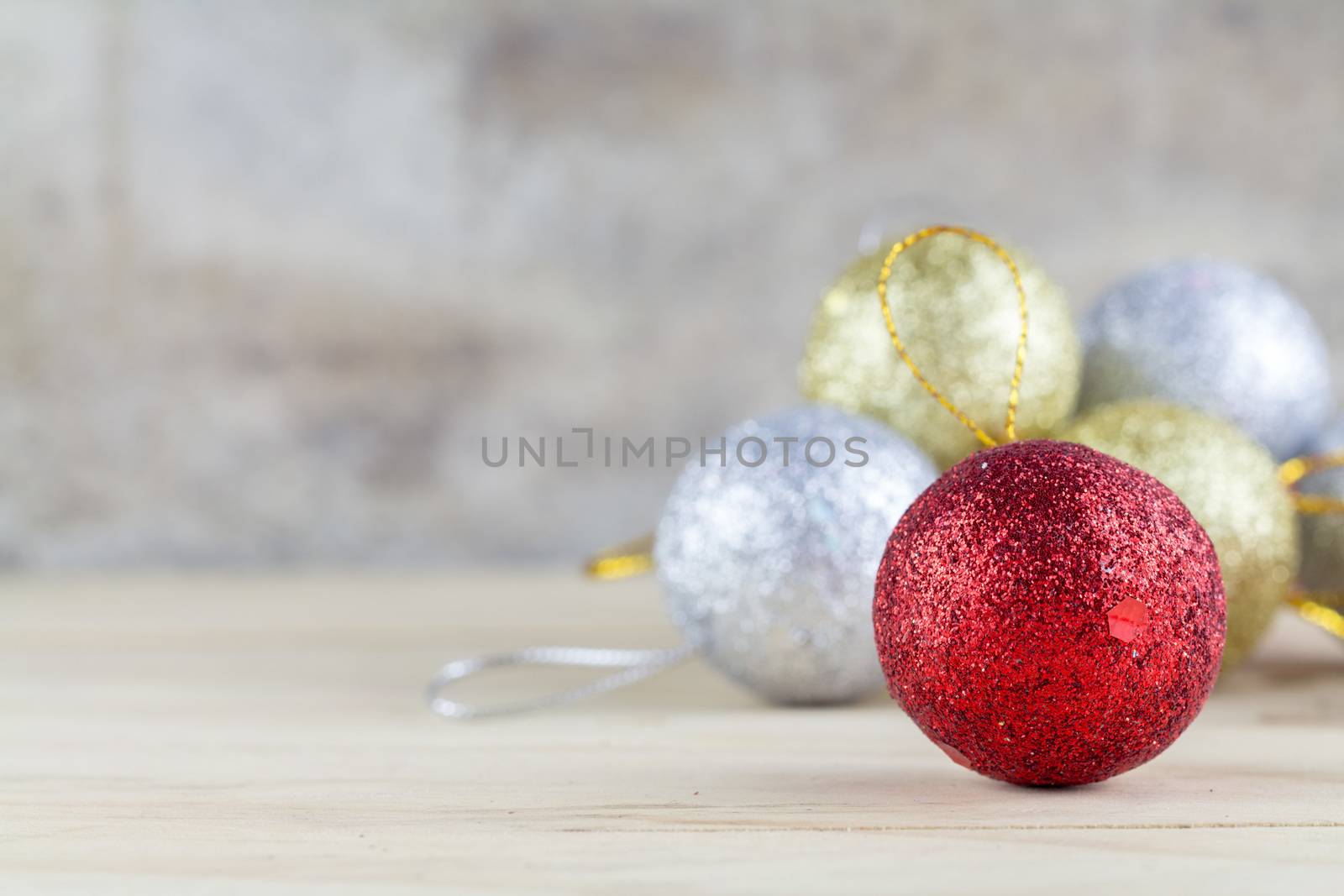 Christmas decoration with bauble ball on wooden table background by 9Chai