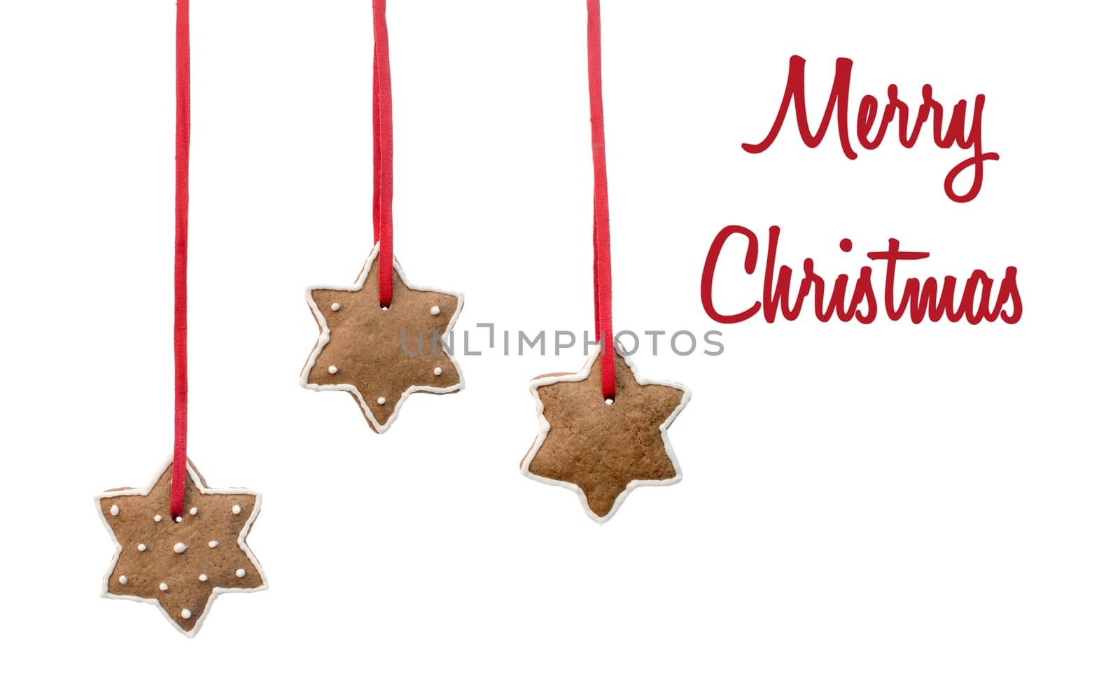 Three gingerbread stars hanging on red ribbons and text beside.