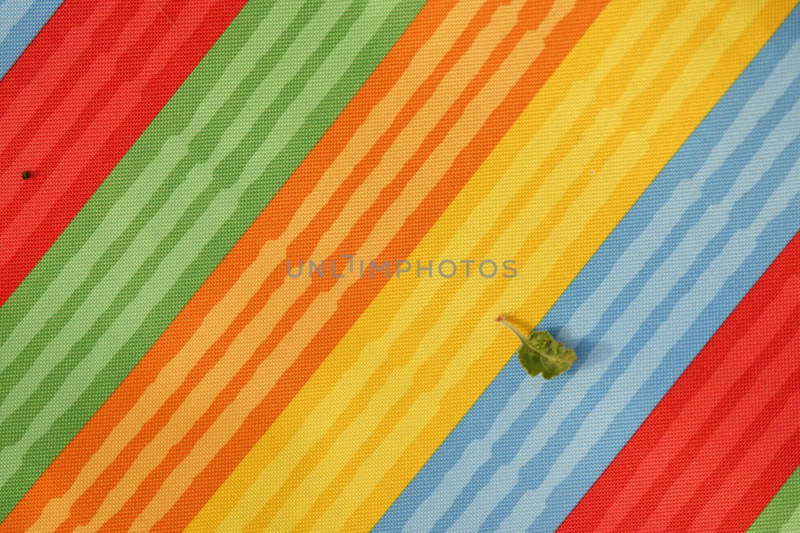 Abstract colorful background stripe textile texture. Macro photo.