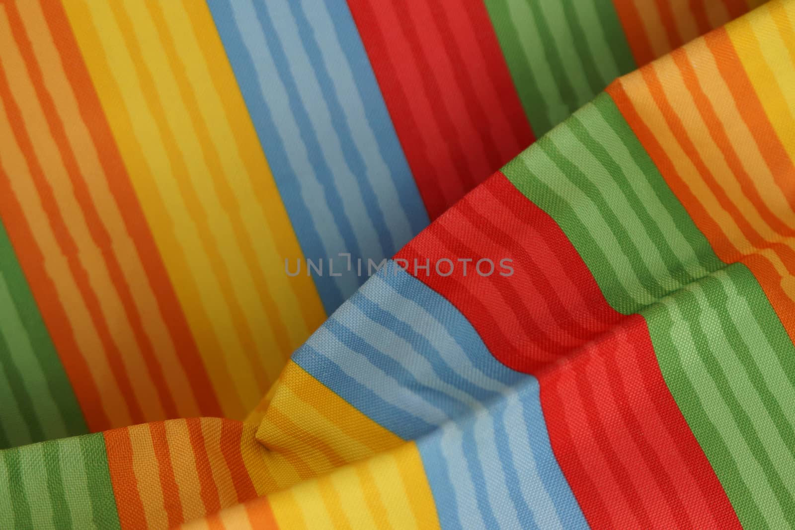 Abstract colorful background stripe textile texture. Macro photo.