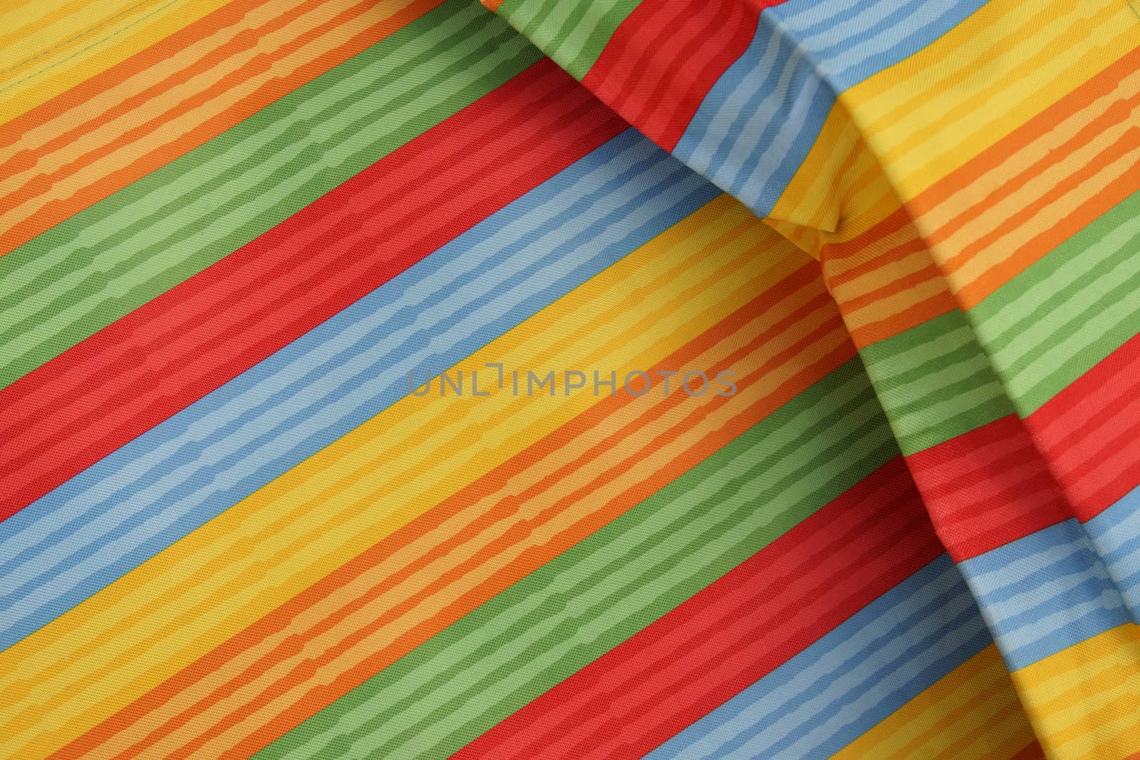 Abstract colorful background stripe textile texture. Macro photo.