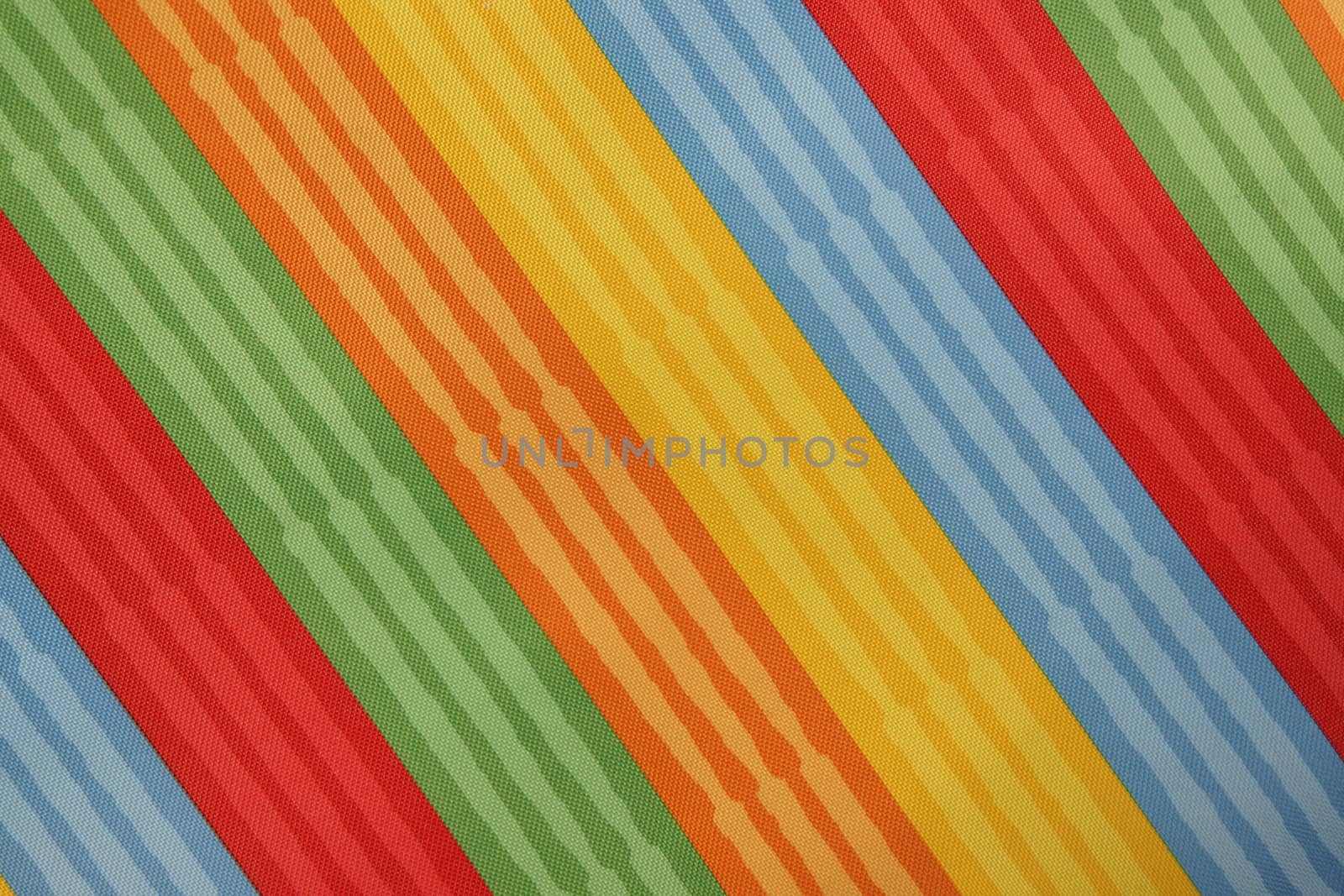 Abstract colorful background stripe textile texture. Macro photo.