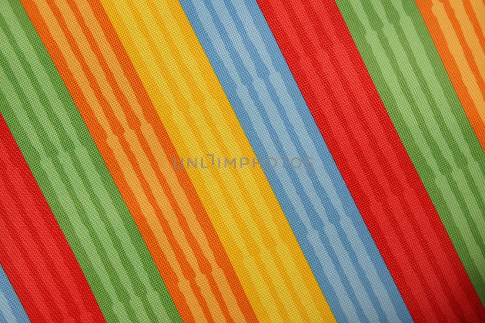 Abstract colorful background stripe textile texture. Macro photo.