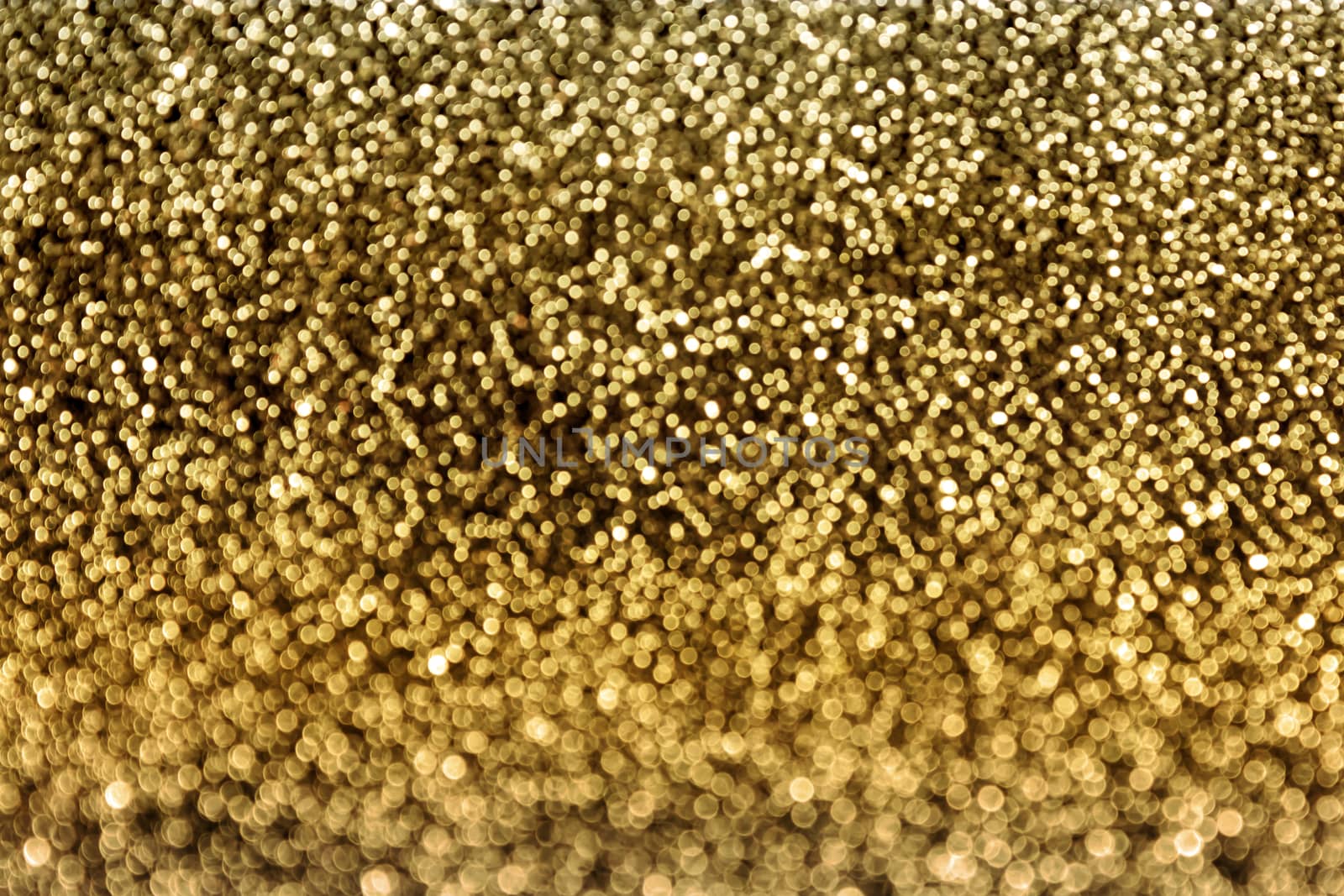 Gold colour bokeh glow light background