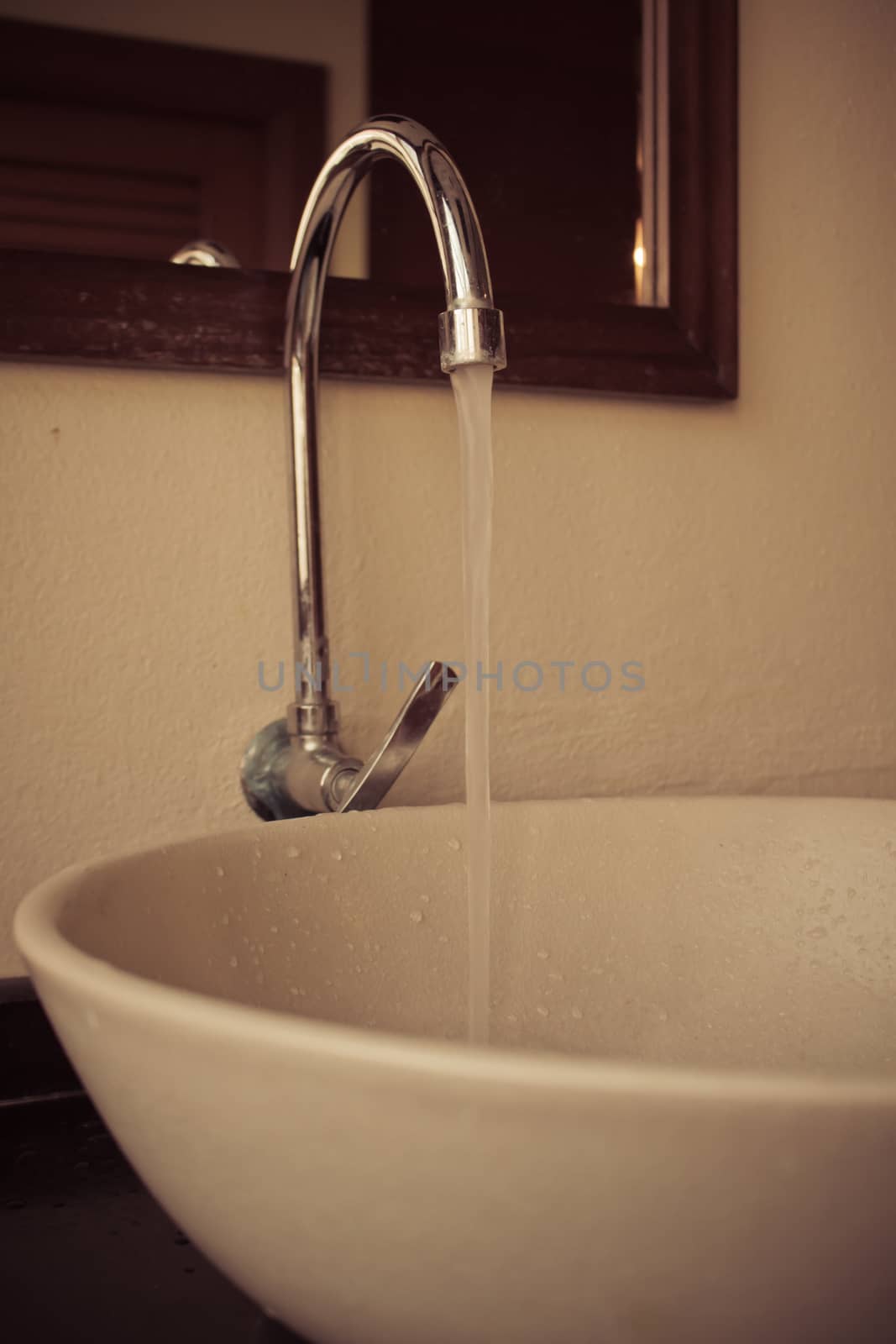 Water tap in the bathroom by worrayuth