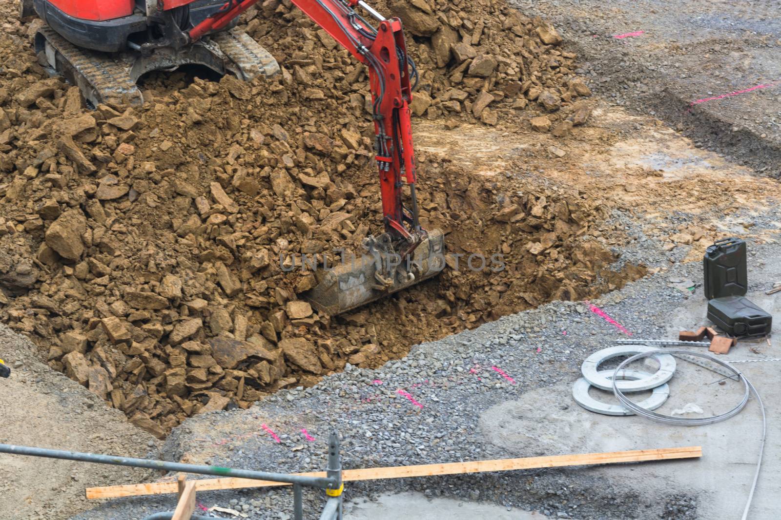 Mini excavator with excavation work for a new construction home.