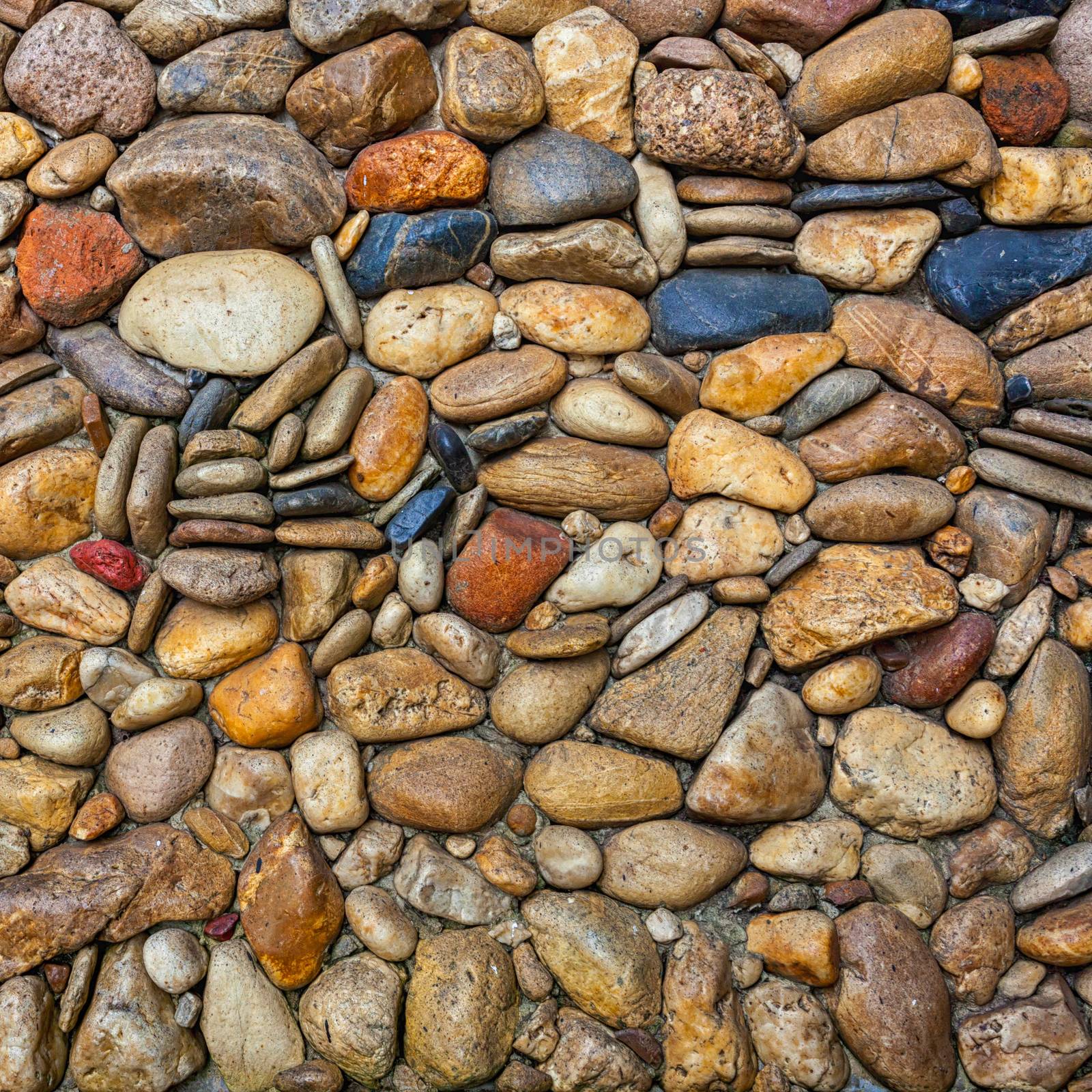 Sea stones pebble texture background .