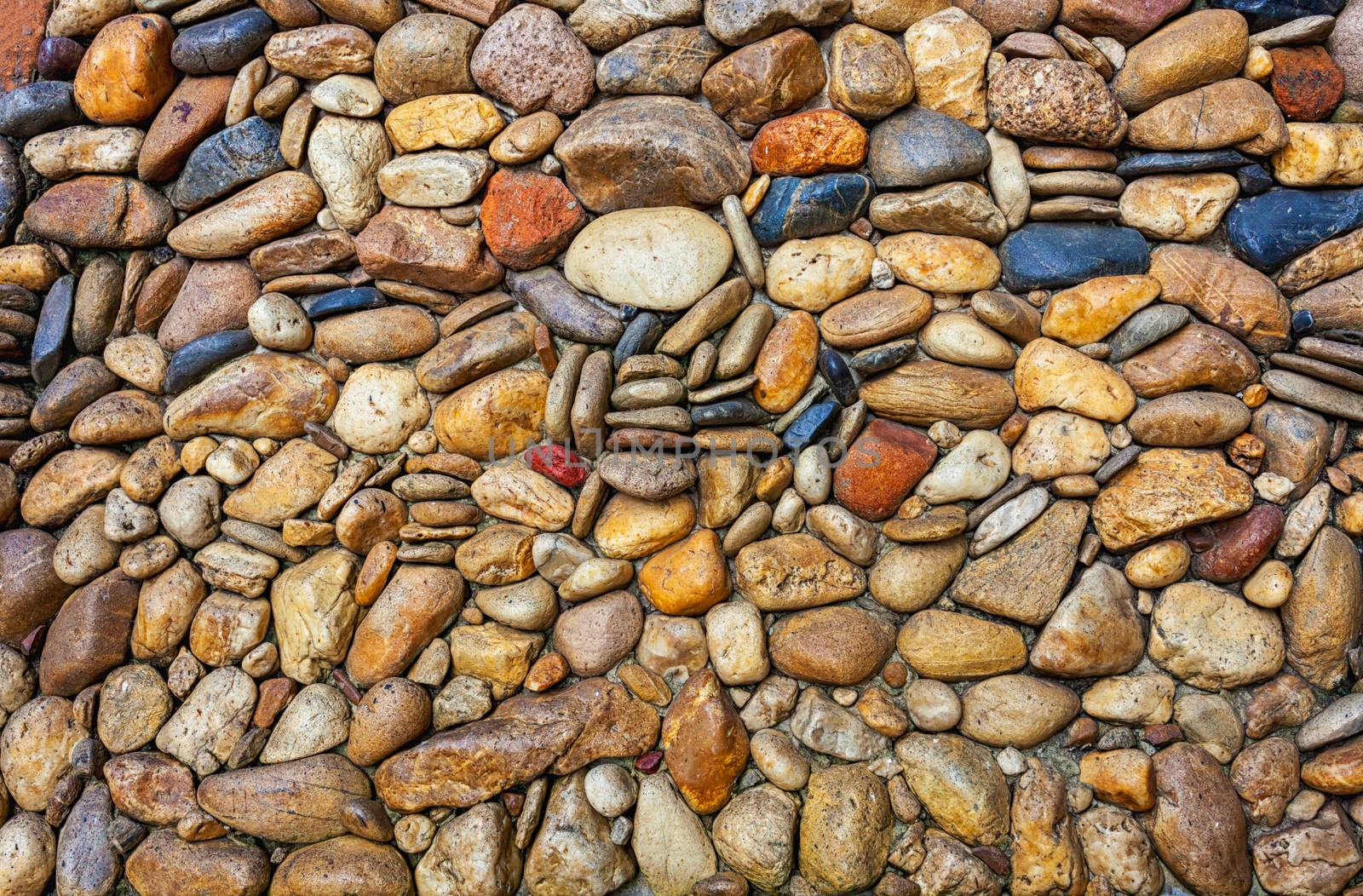 Sea stones pebble texture background .