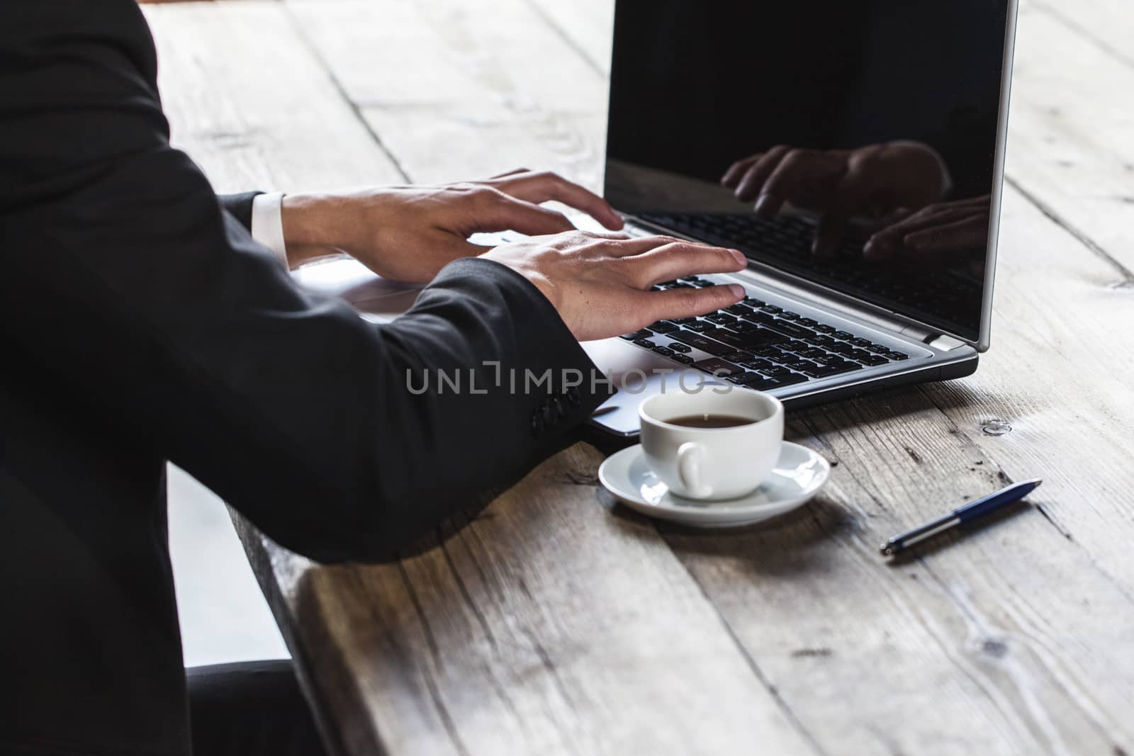 Man using laptop by ALotOfPeople