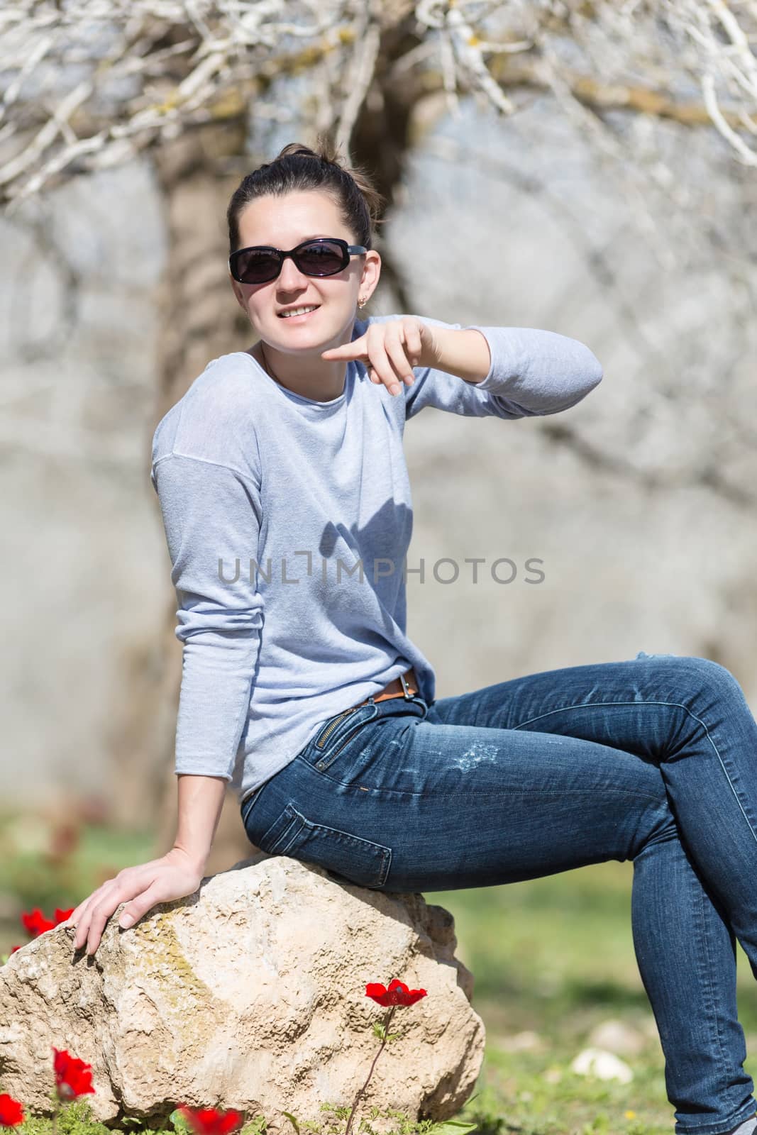 woman relaxing in a field  by MegaArt