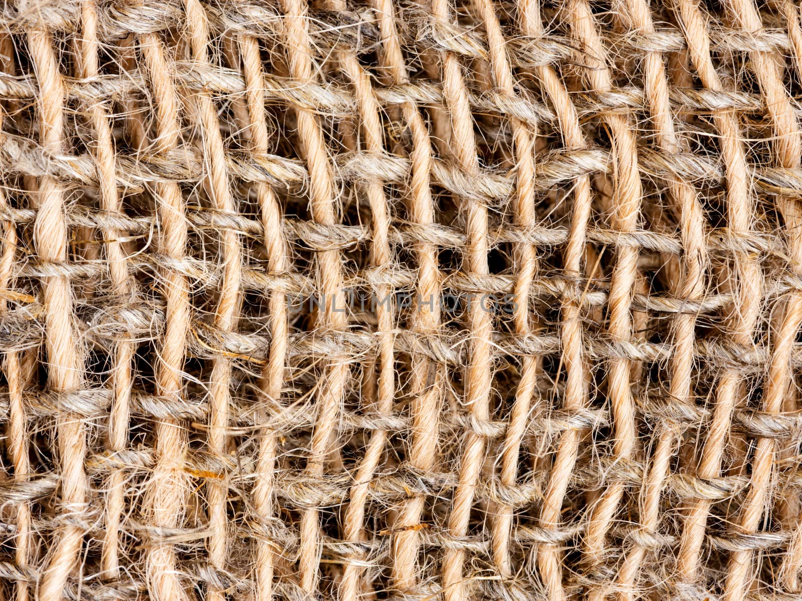 Close up of burlap texture background by fascinadora