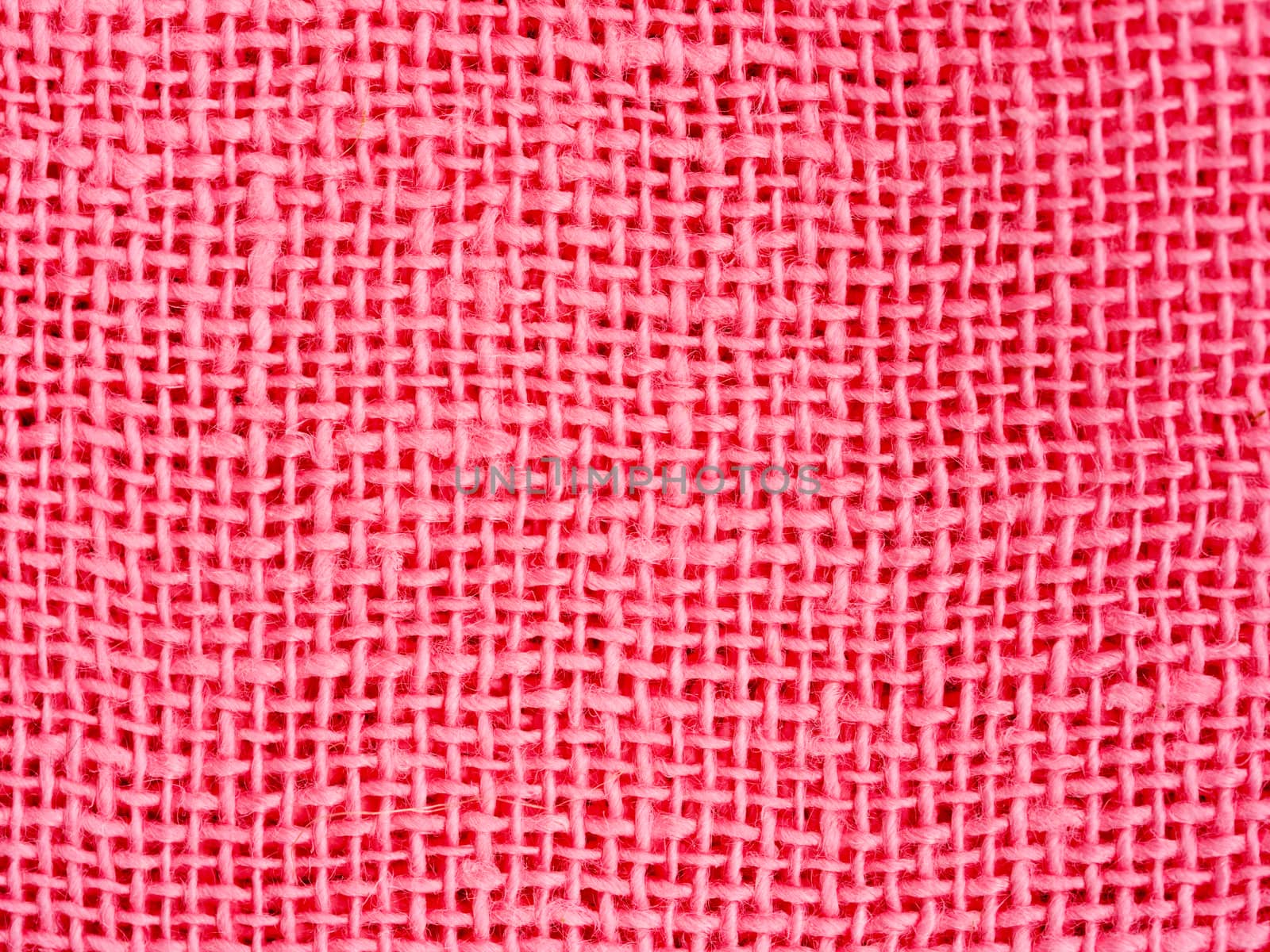 Natural pink fabric weaving as background texture by fascinadora