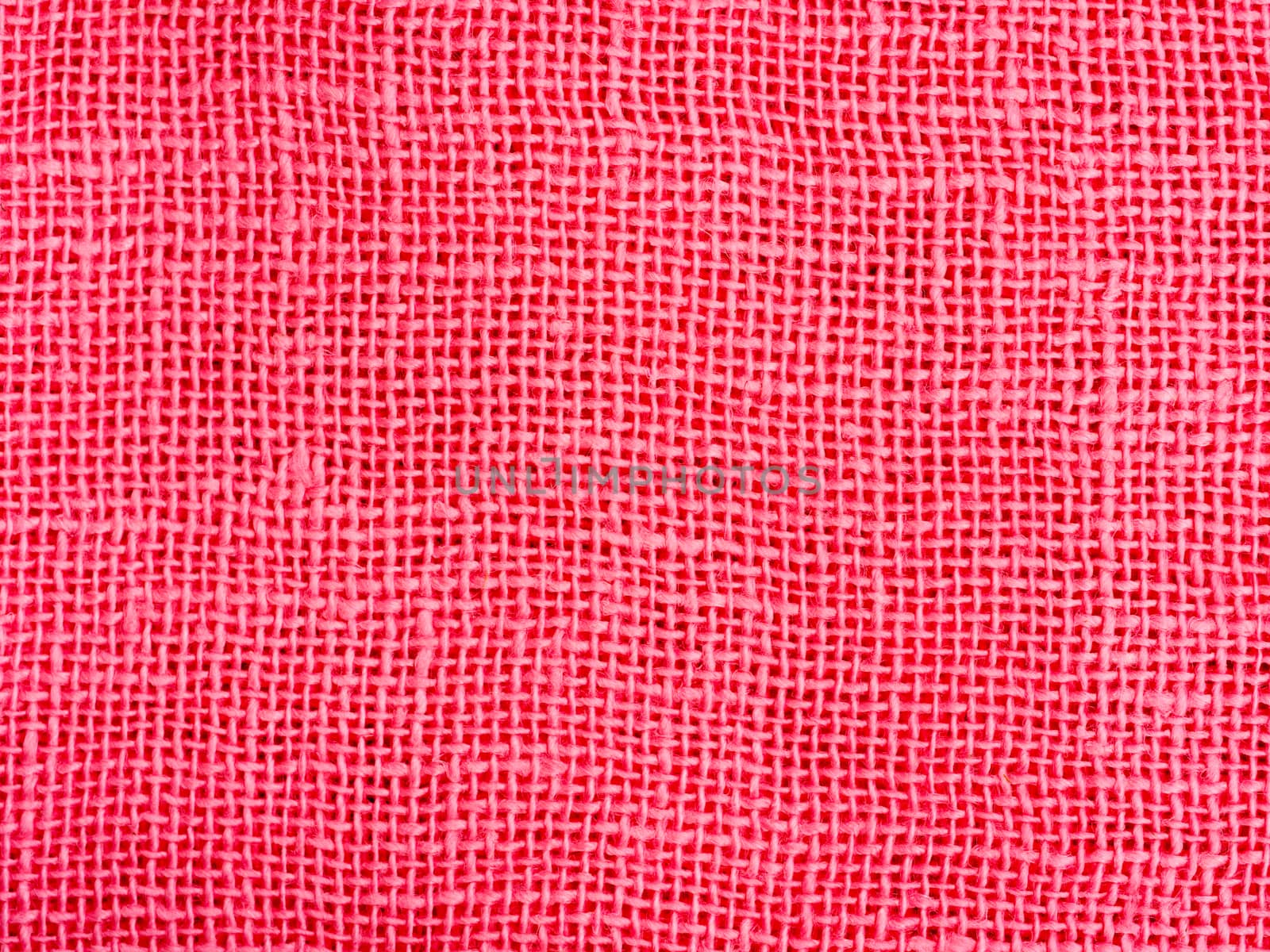 Natural pink fabric weaving as background texture by fascinadora