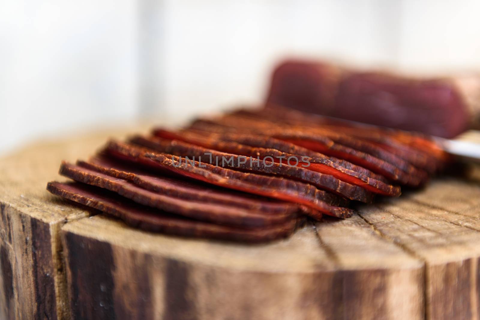 pastrami knife on a wooden table