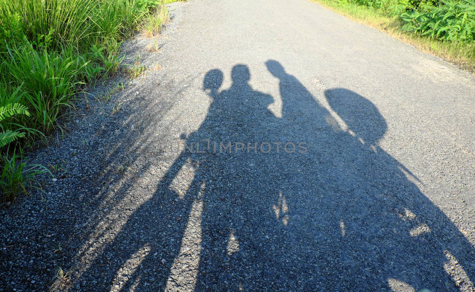 Amazing silhouette of couple on countryside road, summer  journey of backpacker of motorcycle to adventure Vietnam landscape, strong man ride motor on street, Asia couple travel together by motorbike