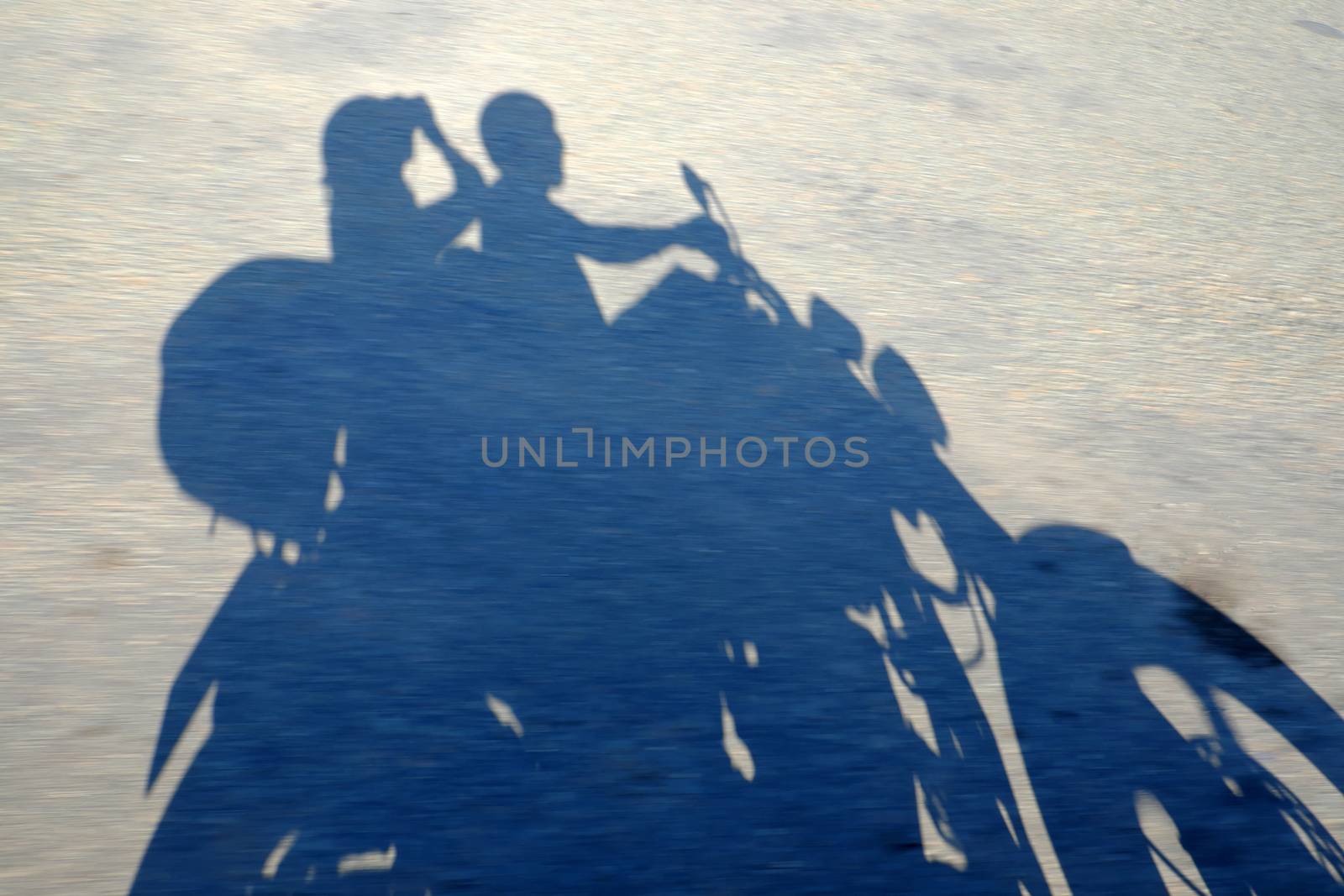 Amazing silhouette of couple on countryside road, summer  journey of backpacker of motorcycle to adventure Vietnam landscape, strong man ride motor on street, Asia couple travel together by motorbike