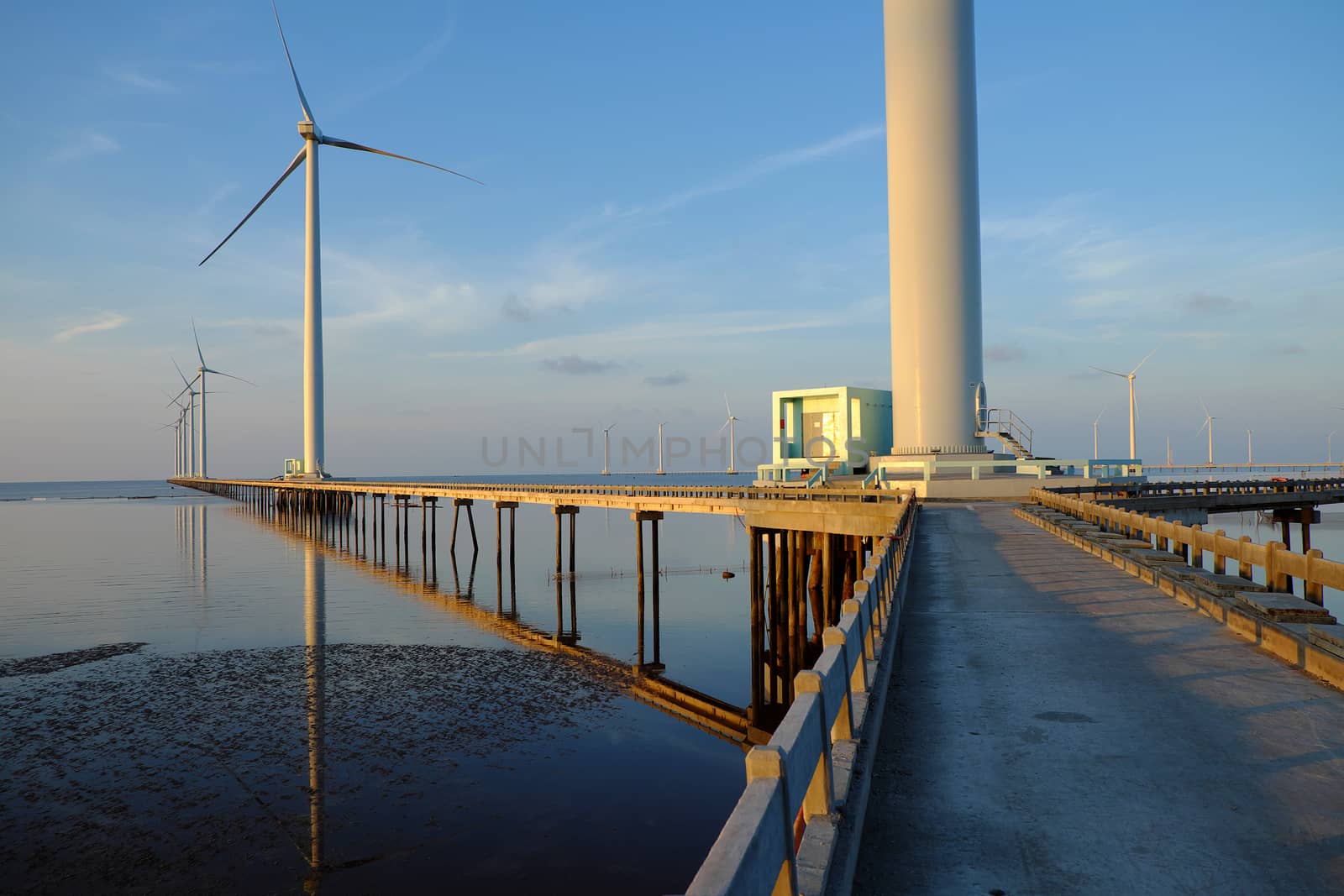 Group of wind turbines of Bac Lieu wind power plant at Mekong Delta, Vietnam. Windmill at Baclieu seaside at morning, make clean energy for Viet nam industry