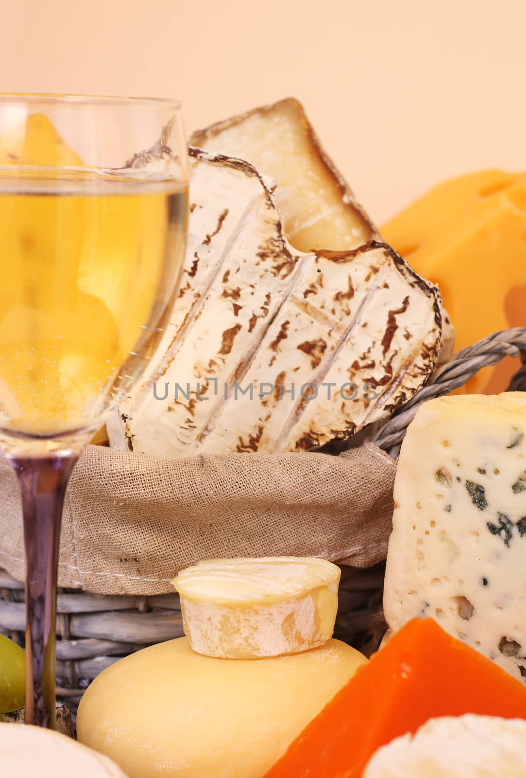 Various types of cheese and wine composition