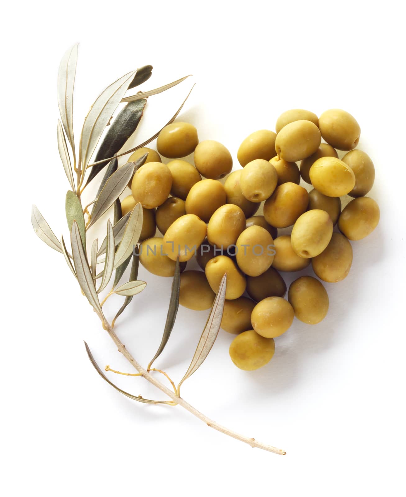 Olives in heart shape isolated on white background