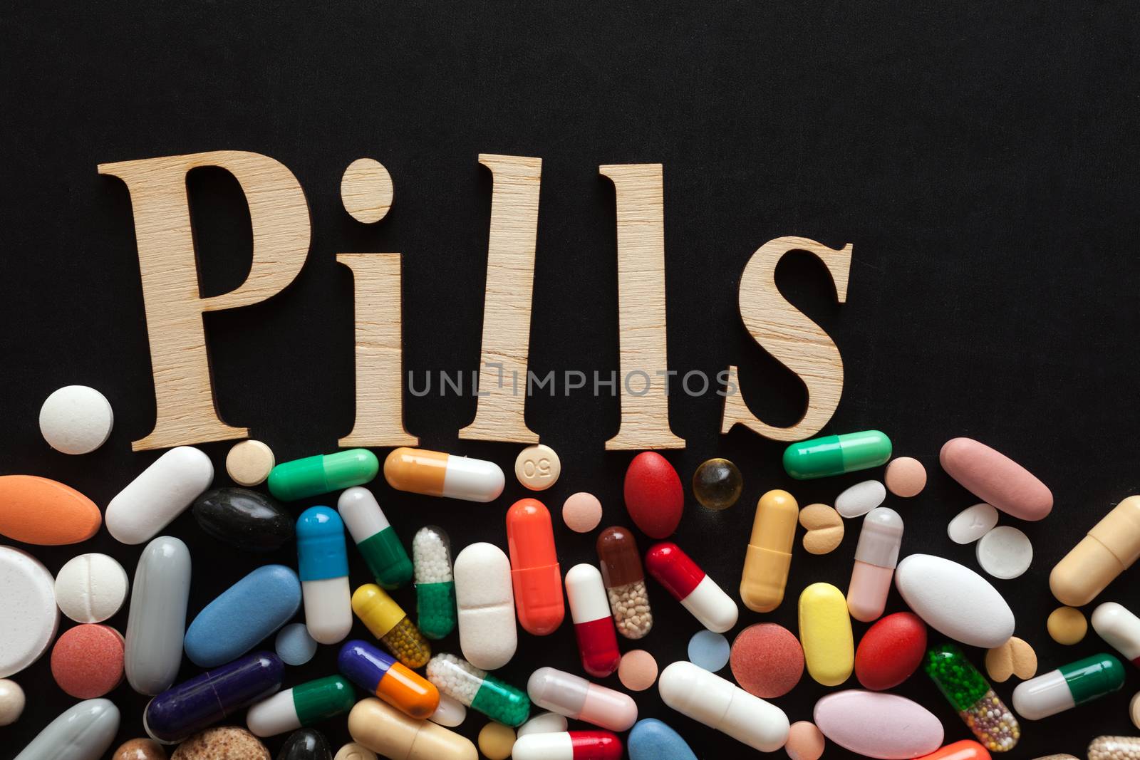 Colorful pills by Portokalis