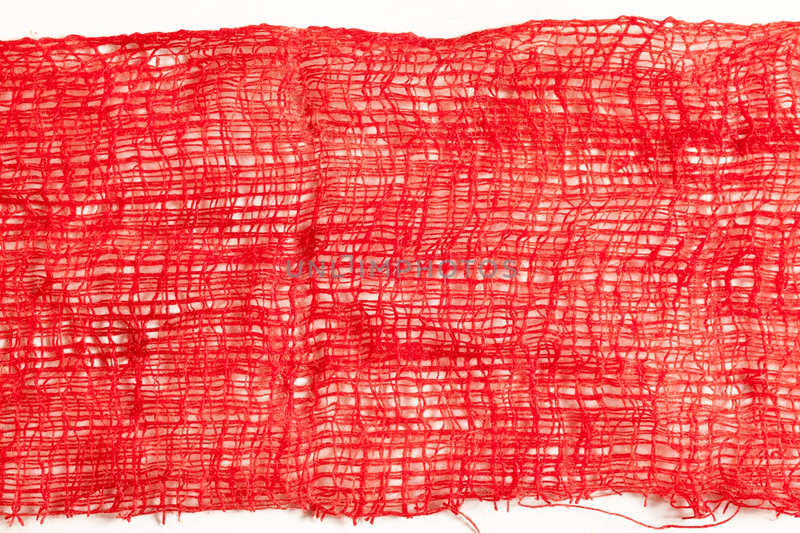 Gauze with blood on white background