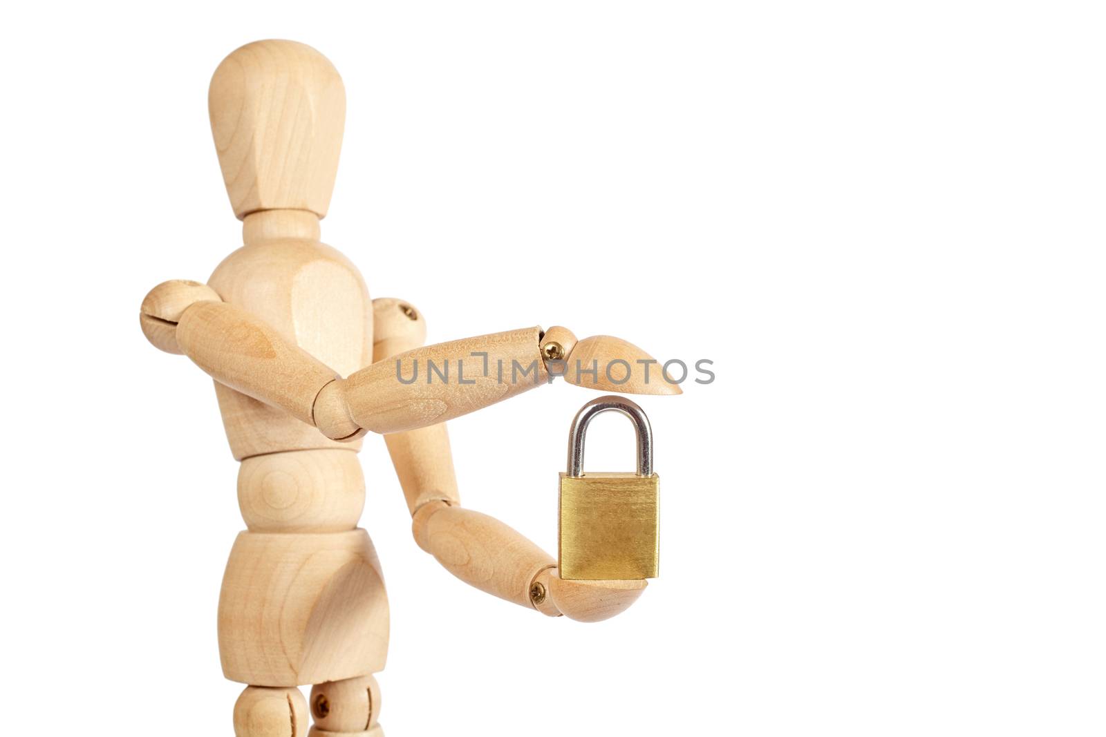 Wooden puppet holds small padlock on white background