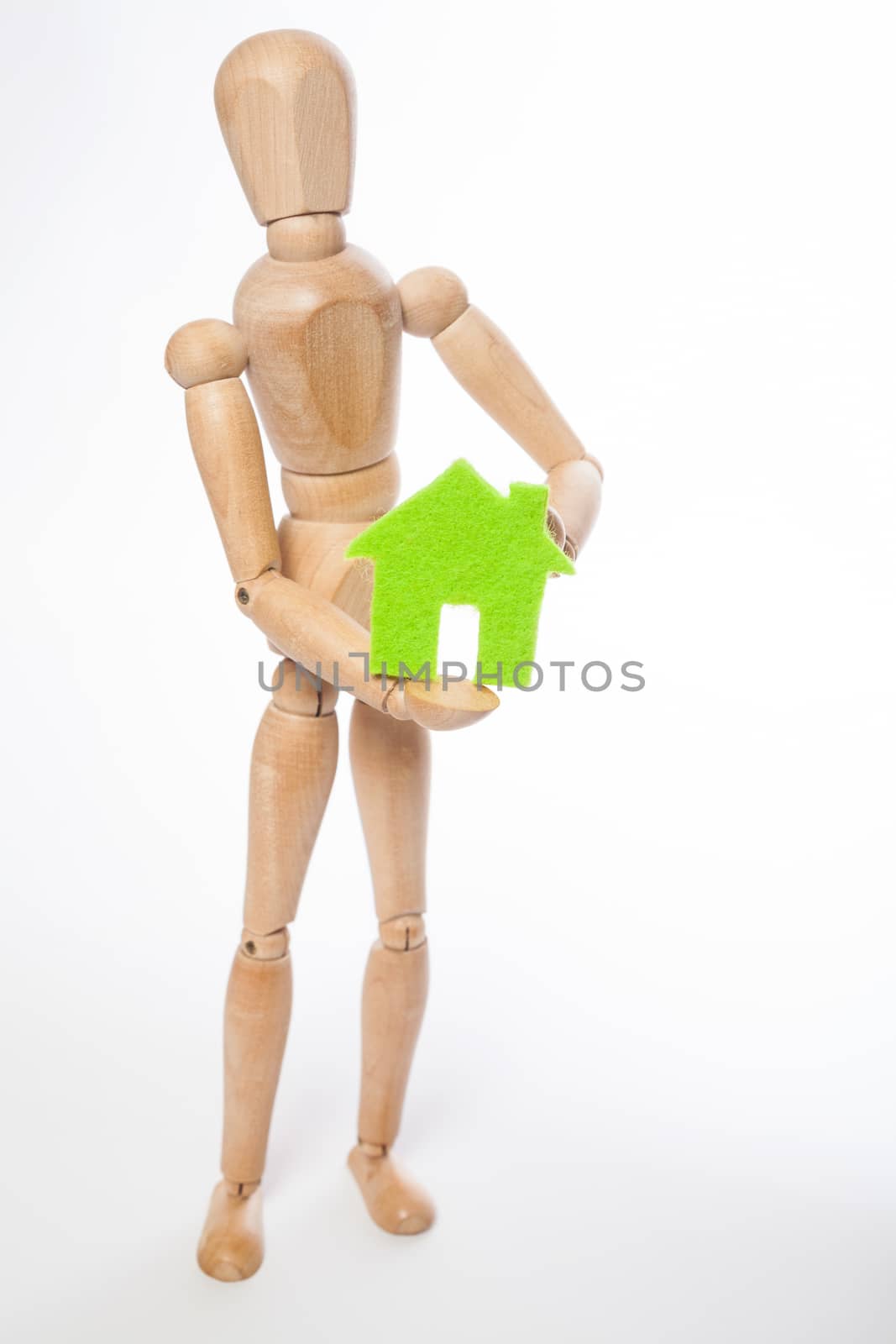 Wooden puppet and house by Portokalis