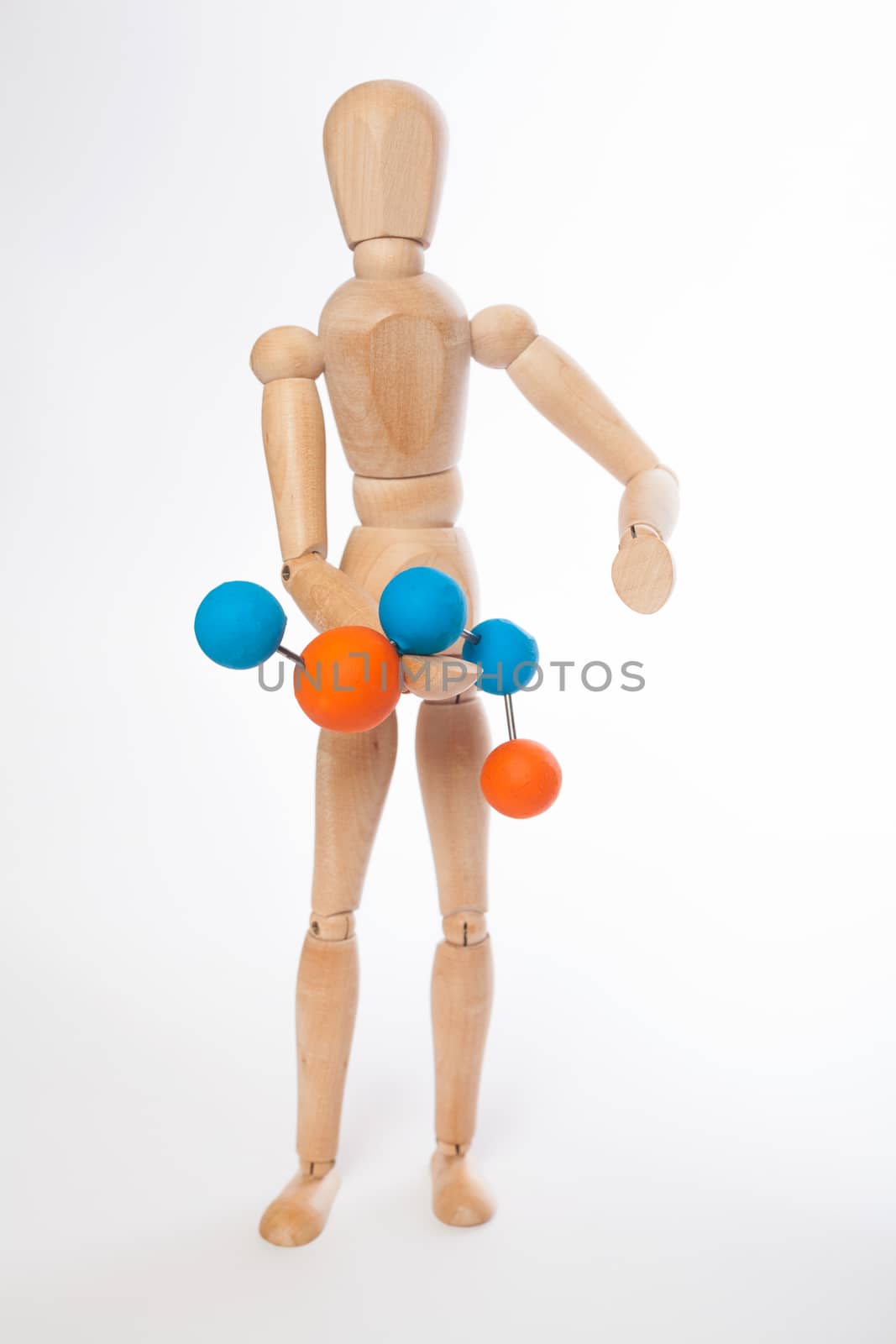 Wooden puppet with molecule on white background