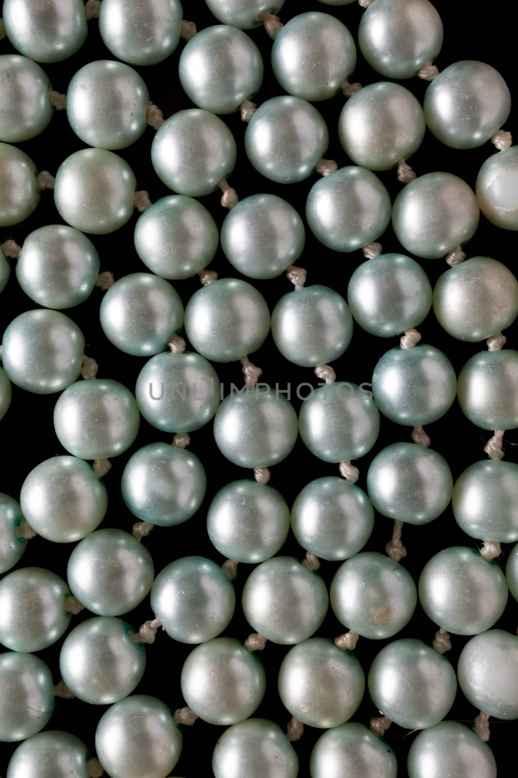 Pearls on black background