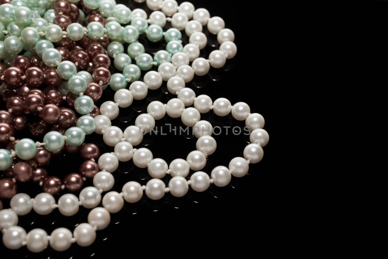 Pearls on black background